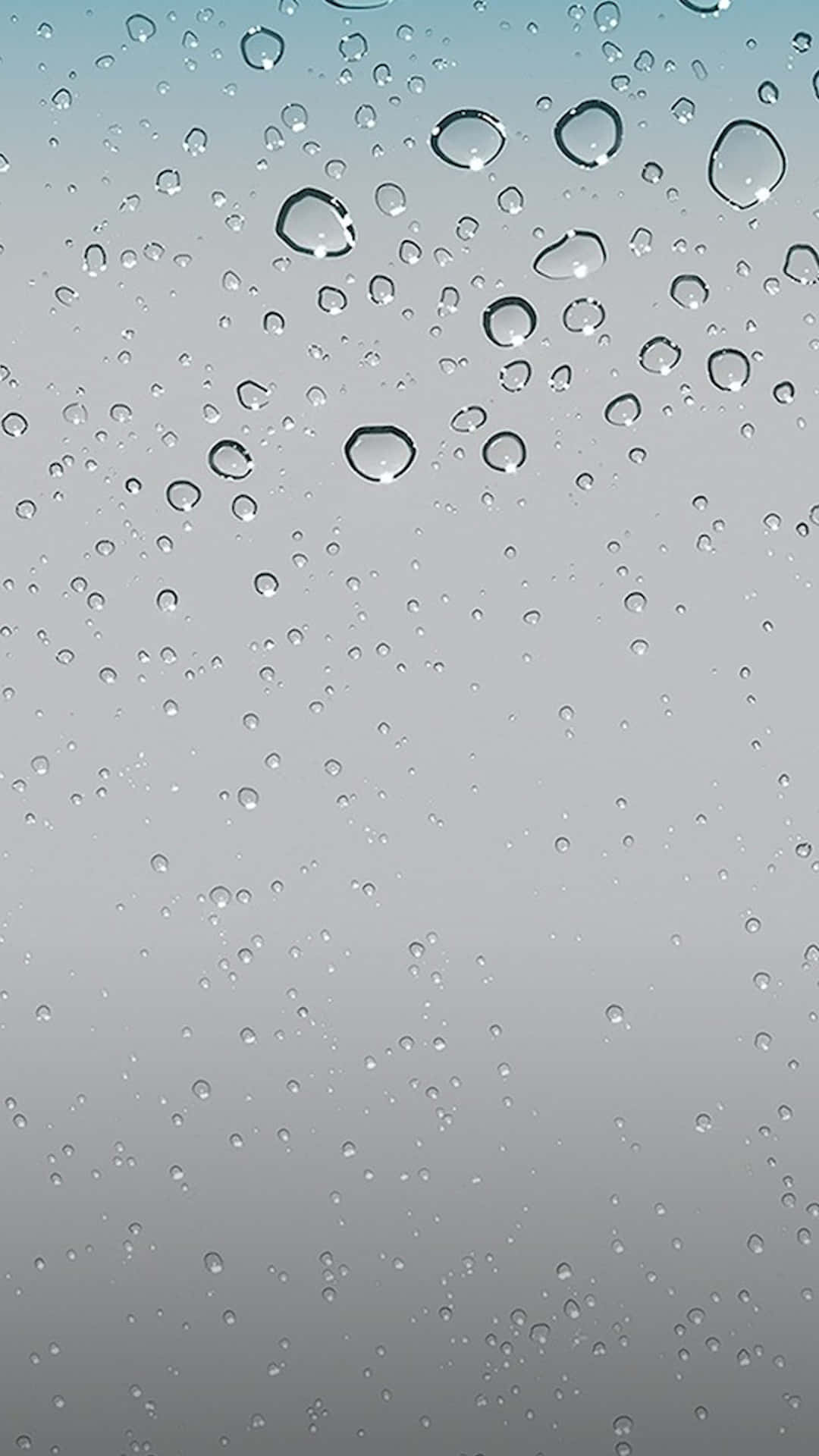 雨滴在玻璃上，漸變天空背景