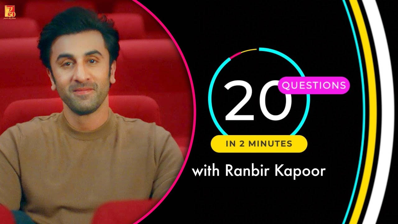 Ranbir Kapoor 坐喺紅色劇院椅上，旁邊係一個用於「2分鐘內20條問題」嘅色彩繽紛圖案。