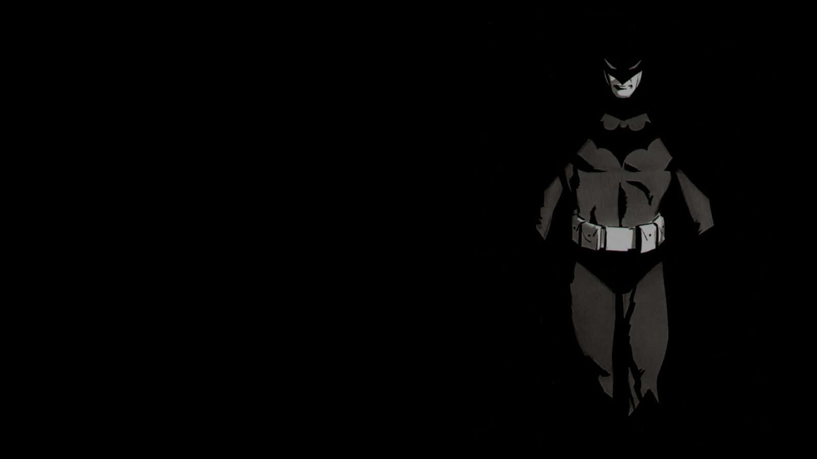 Shadow Of The Bat 桌布 壁紙 — 蝙蝠俠以鮮明的剪影矗立在漆黑的背景前，由單一戲劇性光源照亮，突顯他標誌性的頭罩和多功能腰帶。