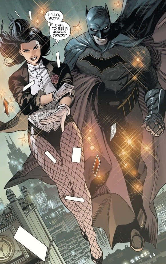 Batman Reborn 桌布 壁紙 — 蝙蝠俠和貓女在閃爍的城市景觀上空翱翔，她正用漂浮的紙牌表演魔術。
