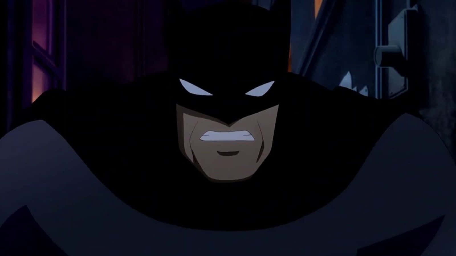 Batman Year One 桌布 壁紙 — 蝙蝠俠在黑暗的城市小巷中，雙眼發光、咬緊牙關，怒目而視。
