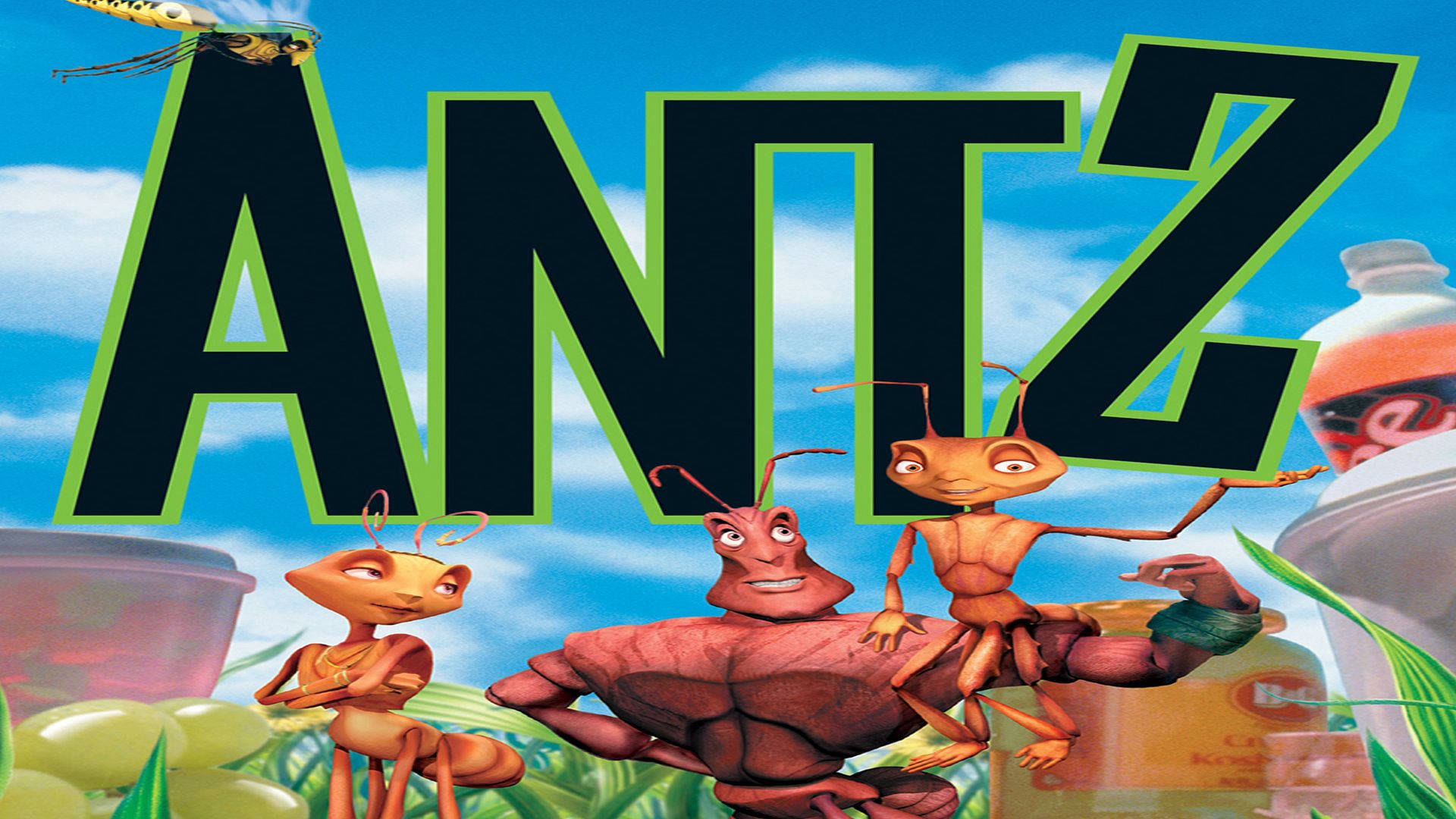 三隻動畫螞蟻在色彩繽紛的戶外環境中，有汽水瓶和標題「ANTZ」。