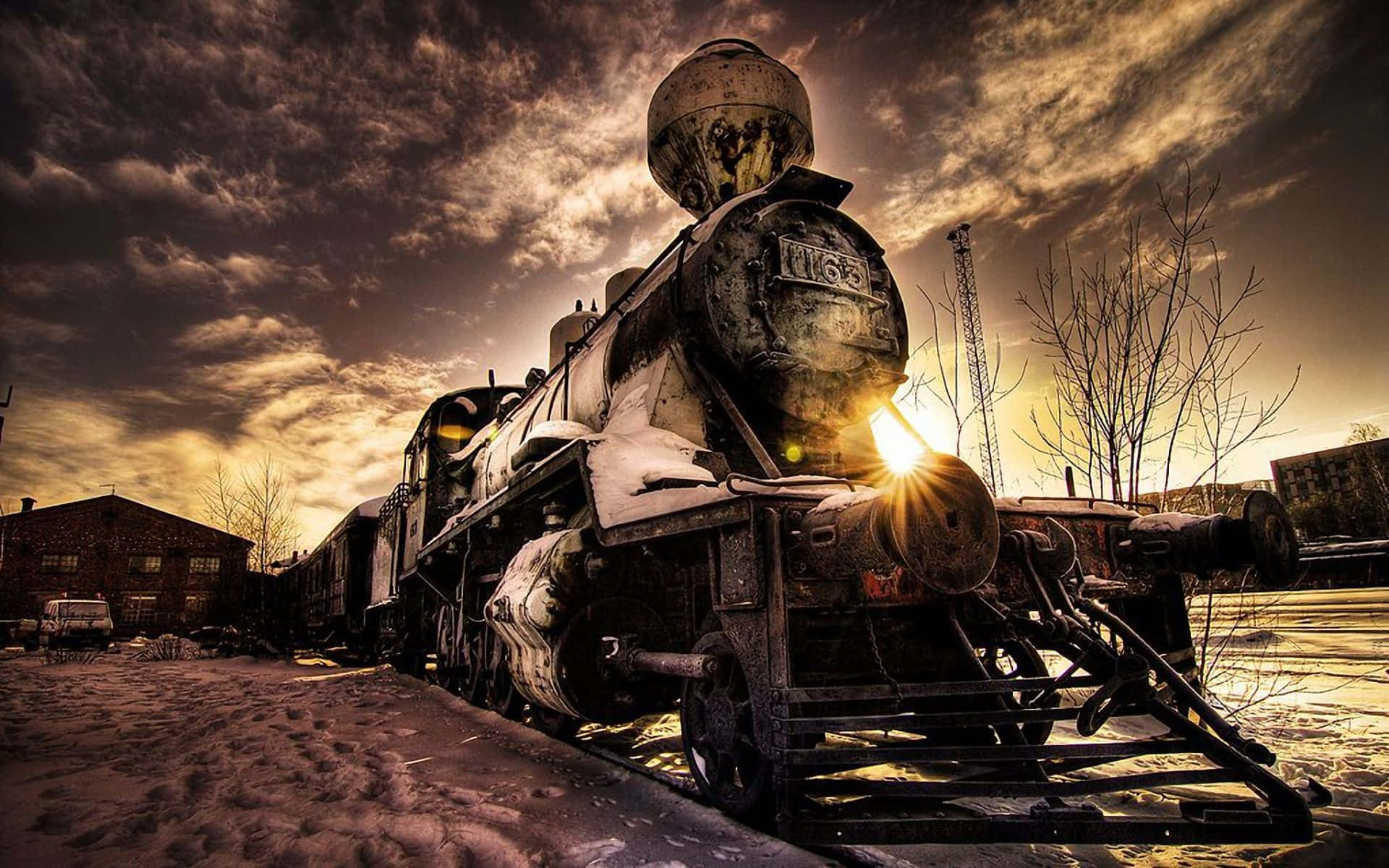 雪地廢棄蒸汽火車，金色夕陽