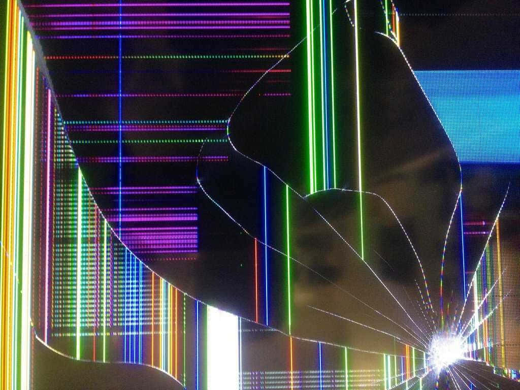 一條發光的數碼隧道，帶有彩色霓虹線條和像素圖案。
