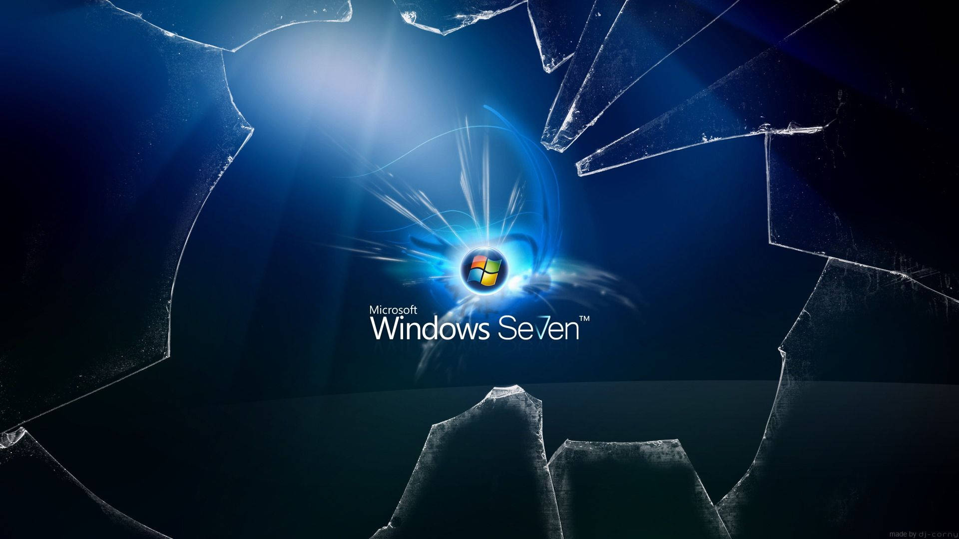 Windows Seven 標誌在深藍色中透過破碎玻璃碎片發光。