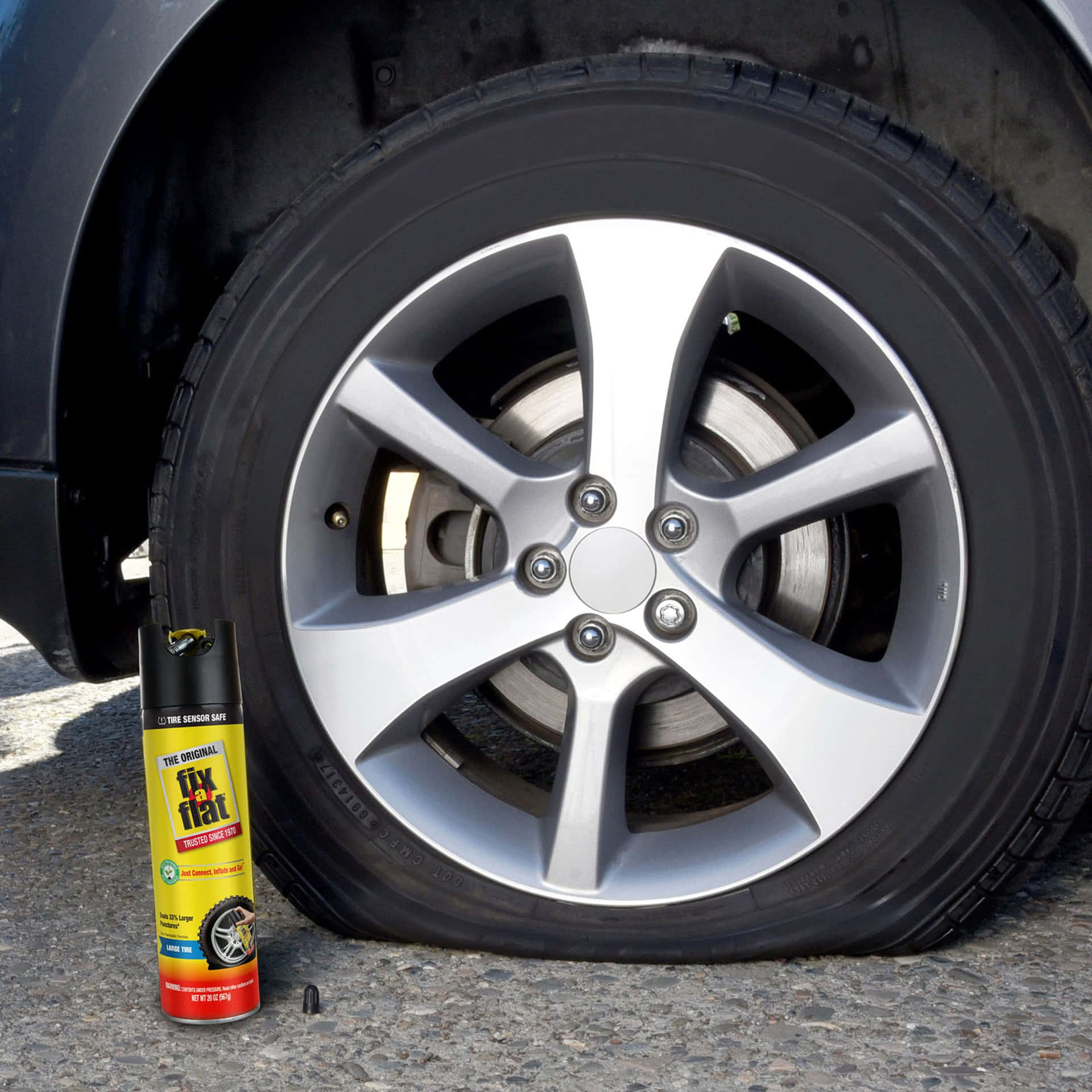 扁平車胎同Fix a Flat罐喺路面