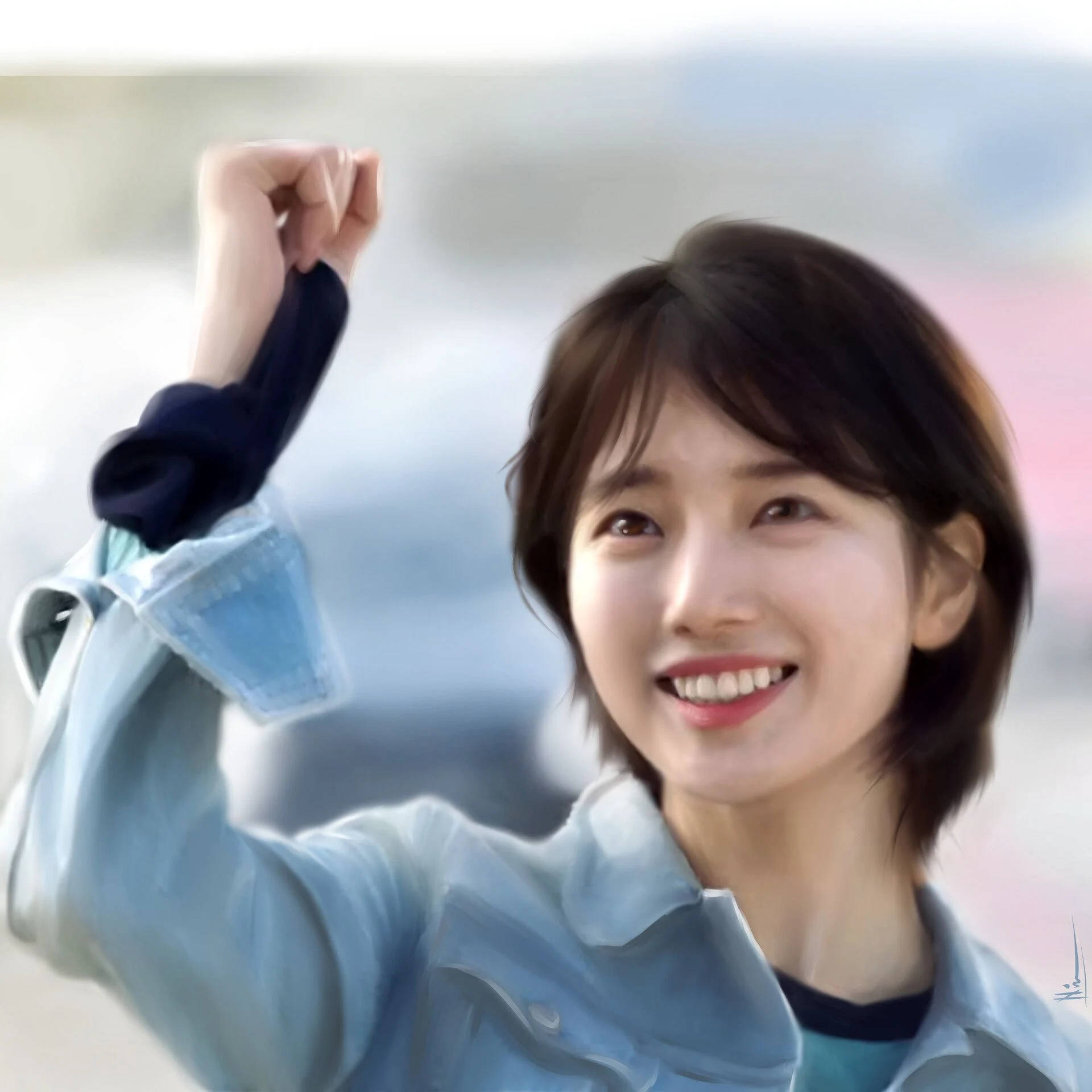 年輕女性穿著牛仔外套微笑並舉起拳頭。
