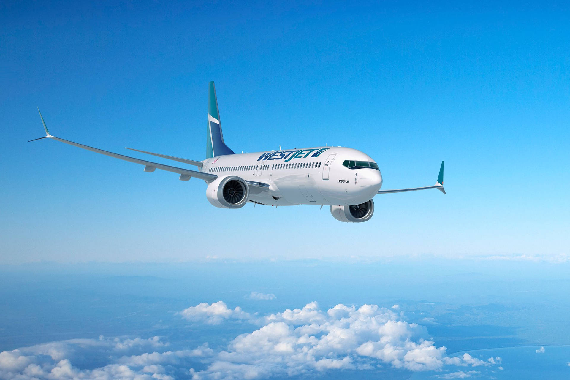 西捷航空飛機在晴朗藍天中飛越雲層