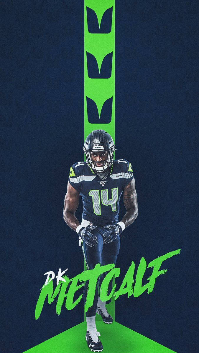 美式足球員 DK Metcalf 穿著海鷹隊制服，帶有綠色和藍色設計元素。