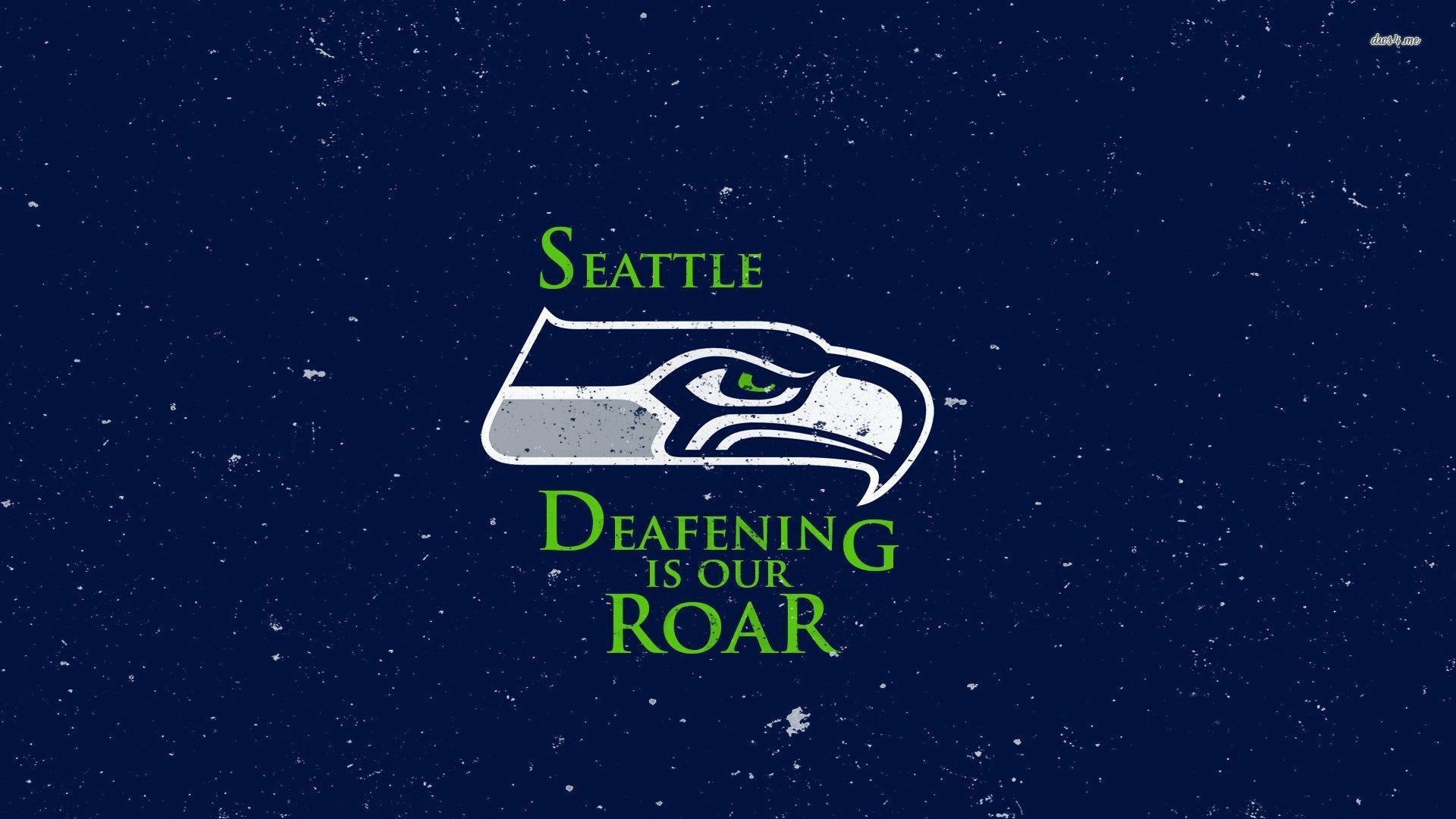 西雅圖海鷹隊標誌，帶有標語「Deafening Is Our Roar」，背景為有紋理的深藍色。
