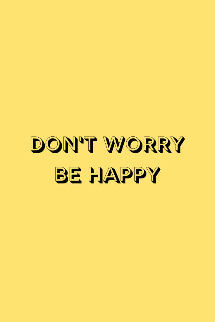 黃色背景上帶有粗體黑色勵志文字「DON'T WORRY BE HAPPY」
