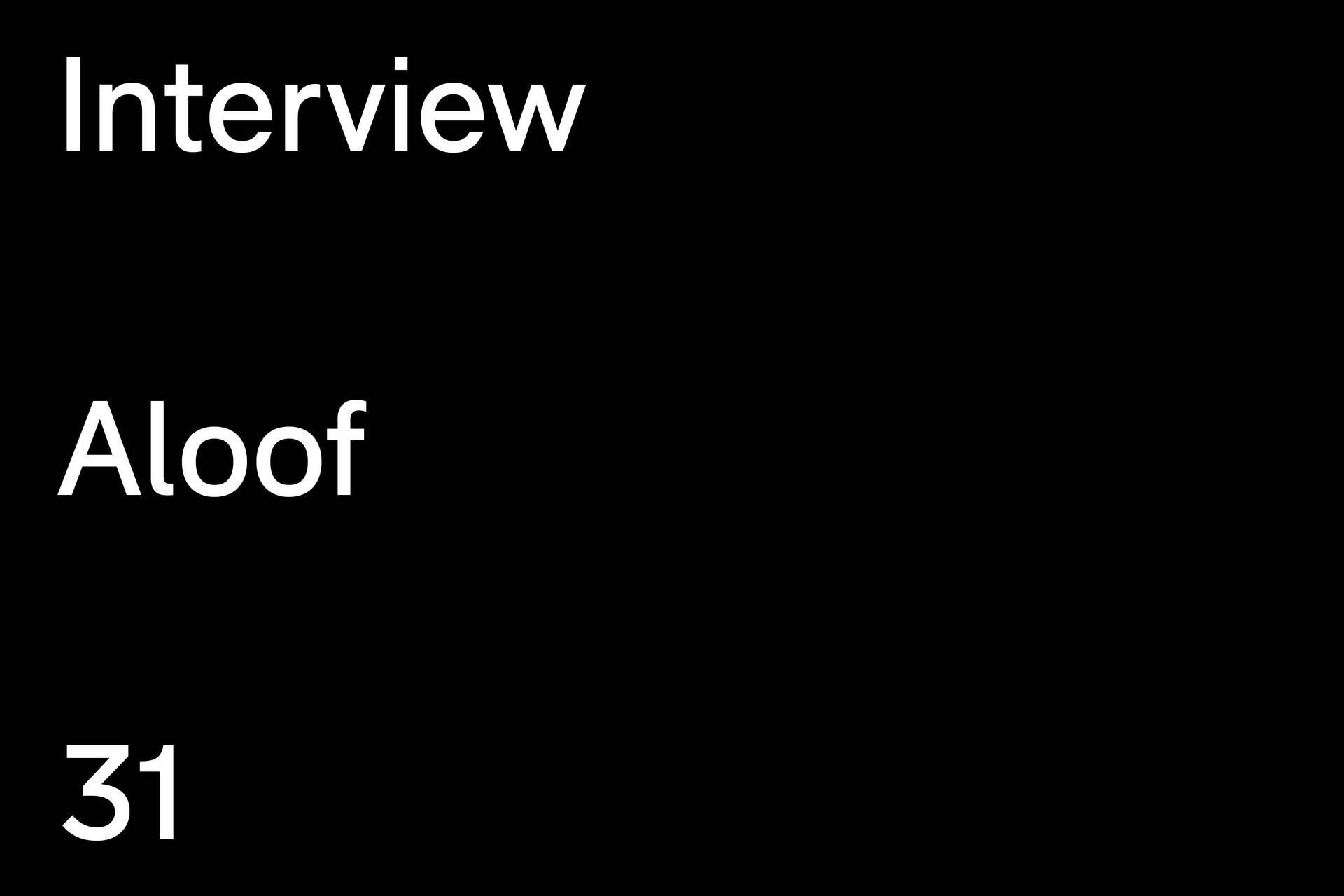 黑色背景上白色文字顯示 Interview Aloof 31