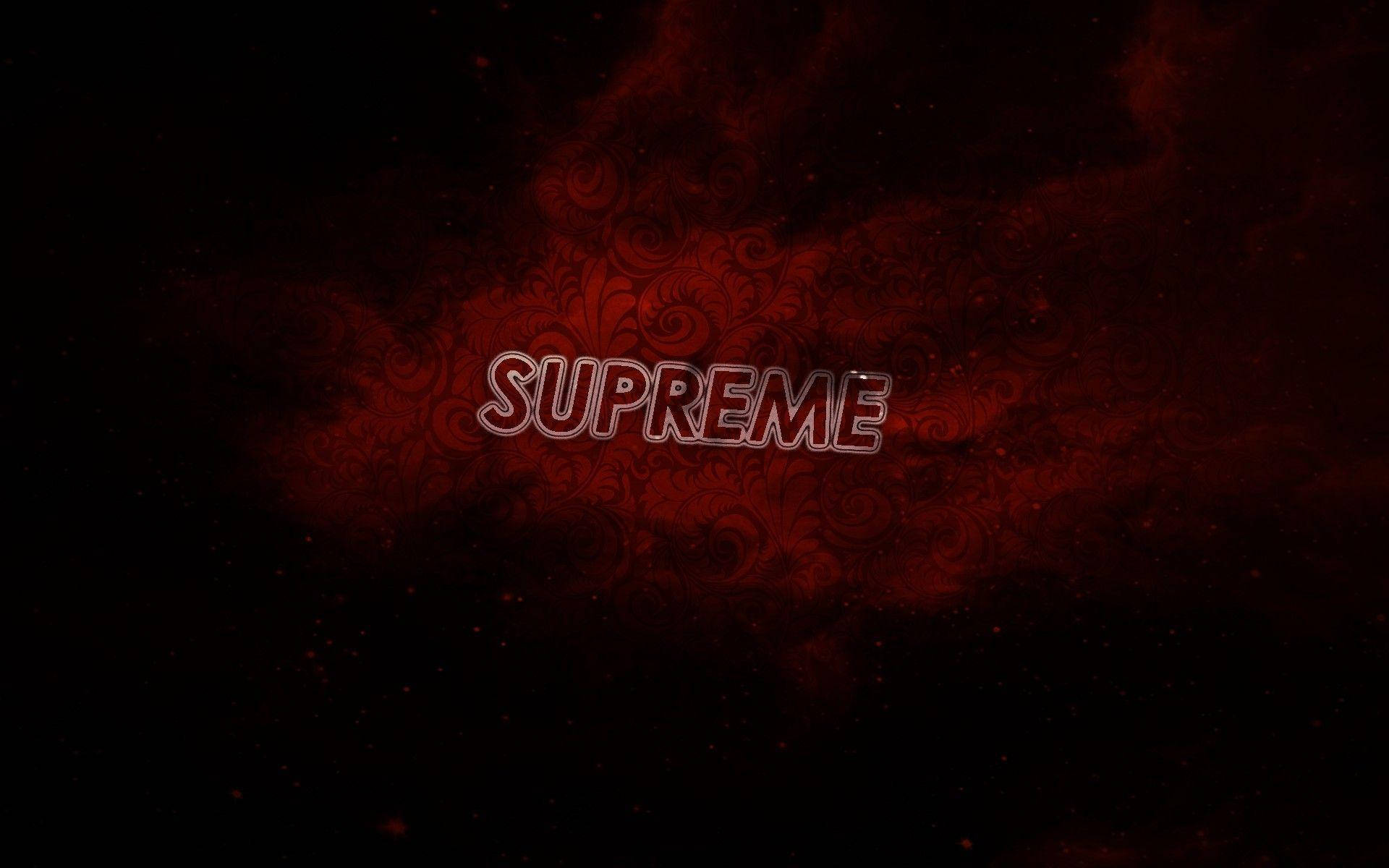 深色背景上帶有旋轉圖案和粒子的紅色發光 supreme 文字。