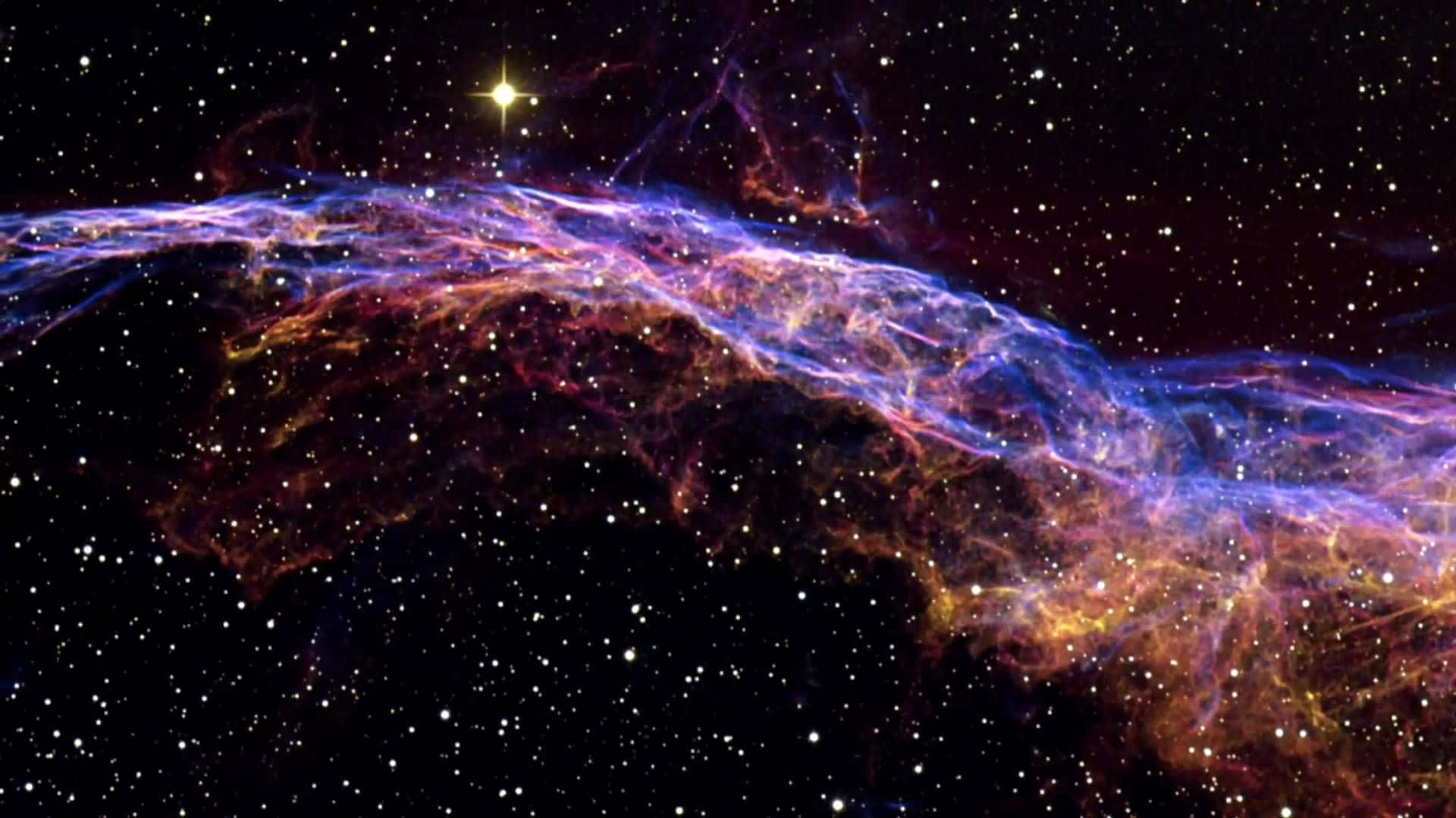 充滿活力的宇宙星雲，帶有紫色、藍色和橙色的雲朵，映襯著繁星點點的夜空。 — 星雲 壁紙