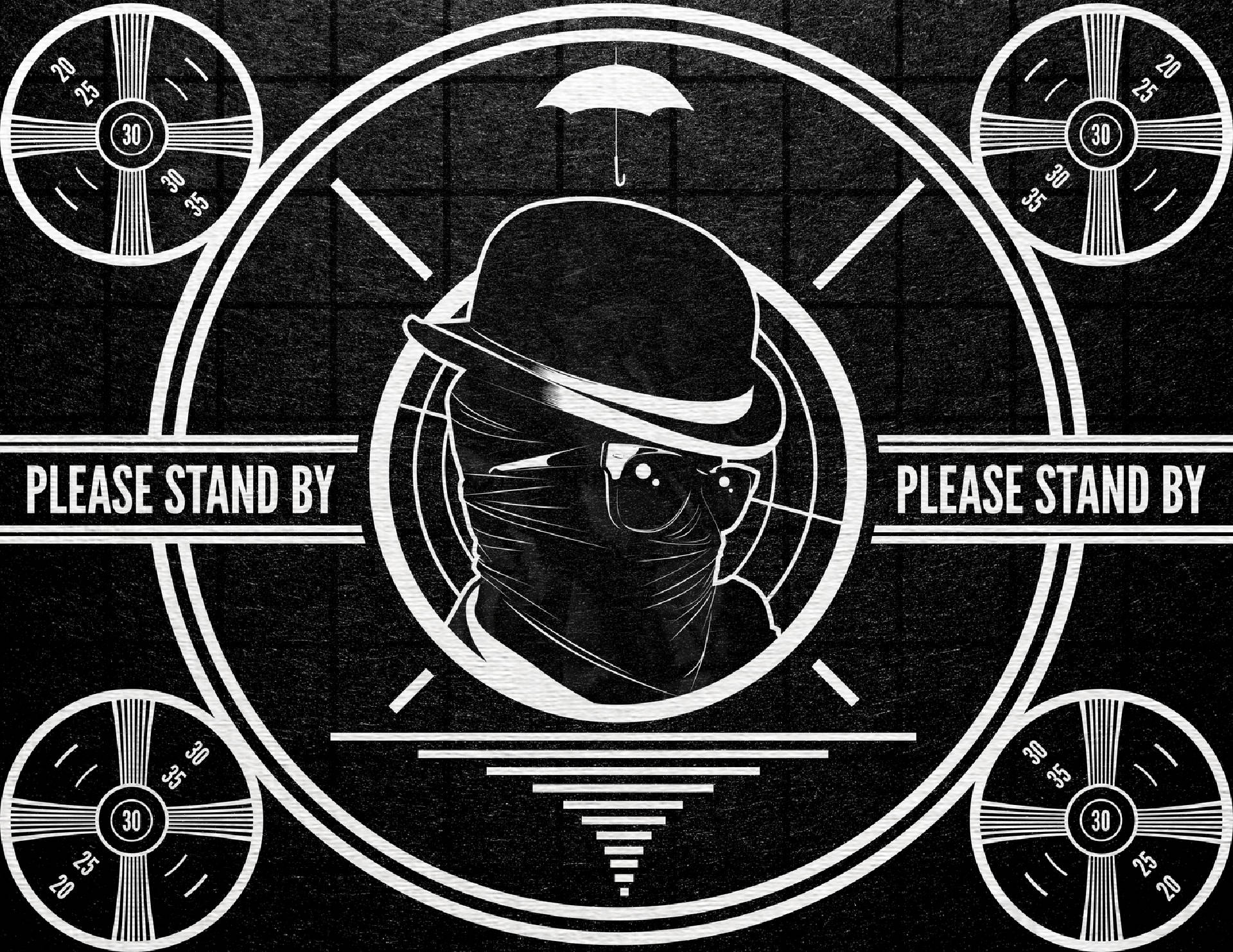 一個戴著圓頂禮帽的蒙面人物，以帶有「PLEASE STAND BY」文字的菲林捲軸介面框住。