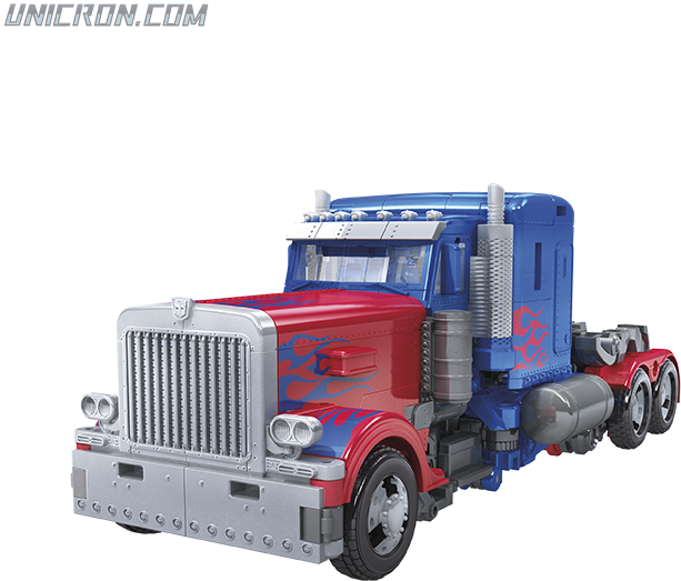 變形金剛奧米加汽車模式 壁紙 — 藍色和紅色的Optimus Prime半掛卡車玩具，帶有銀色格柵和火焰貼花，背景為黑色。
