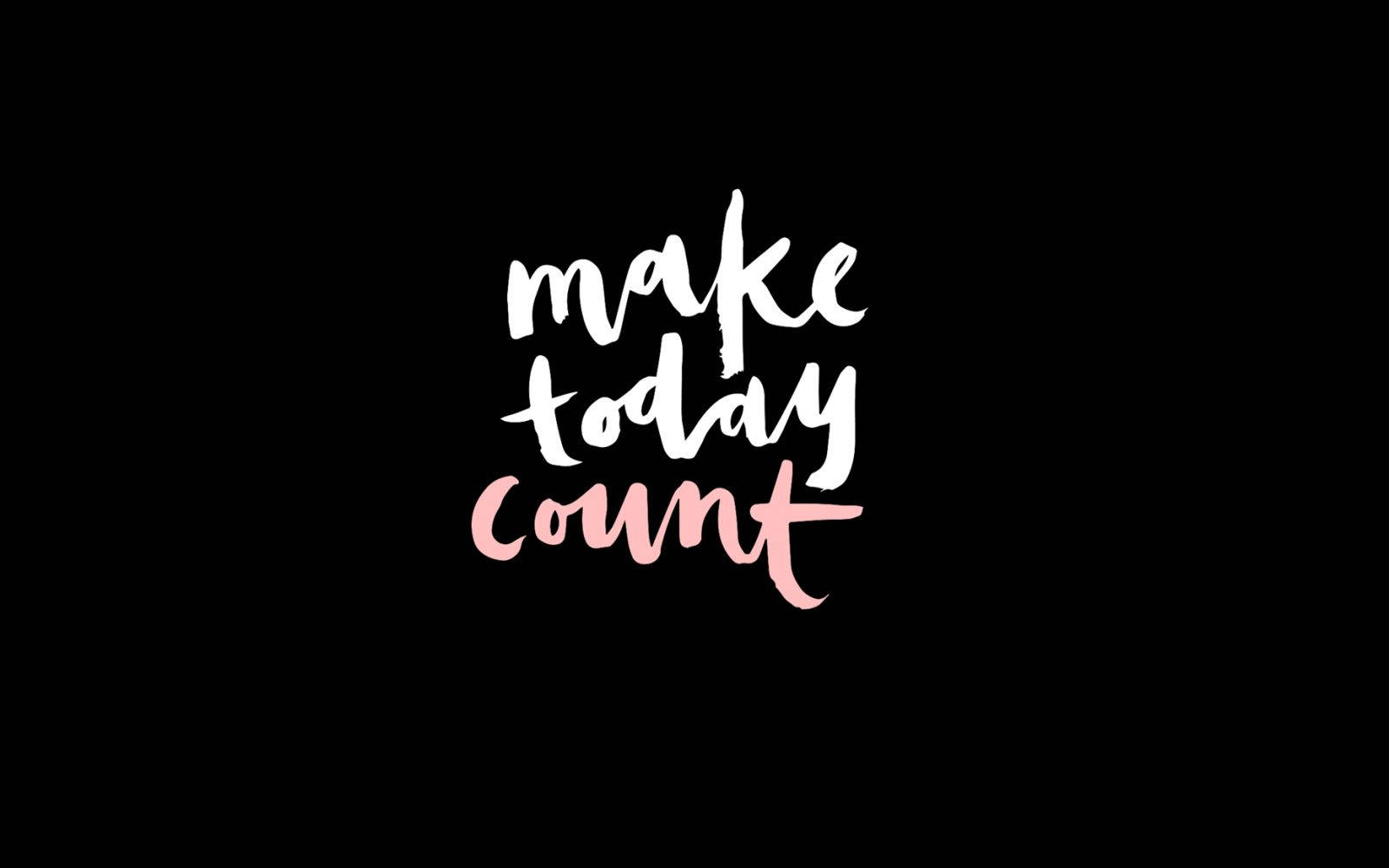 黑色背景上以筆觸字體顯示的勵志短語 make today count