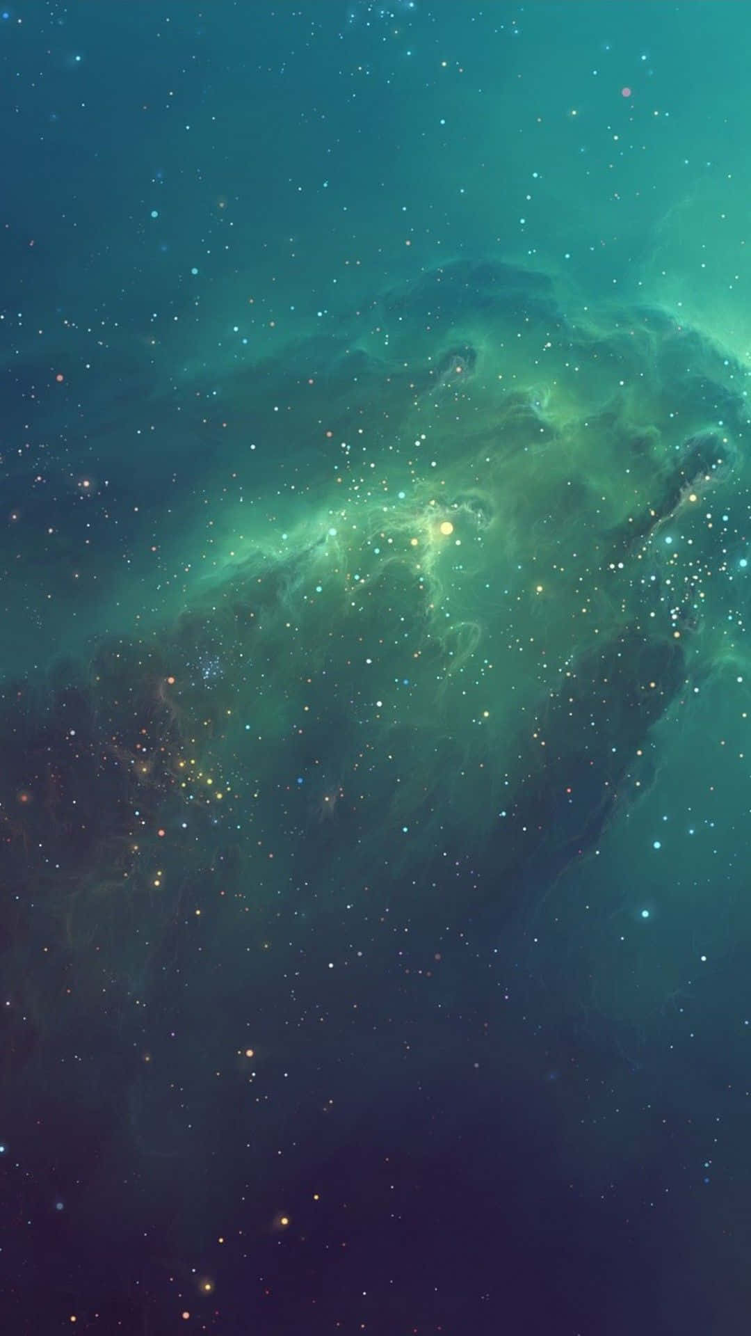 深空中充滿星星的充滿活力的藍綠色和綠色星雲