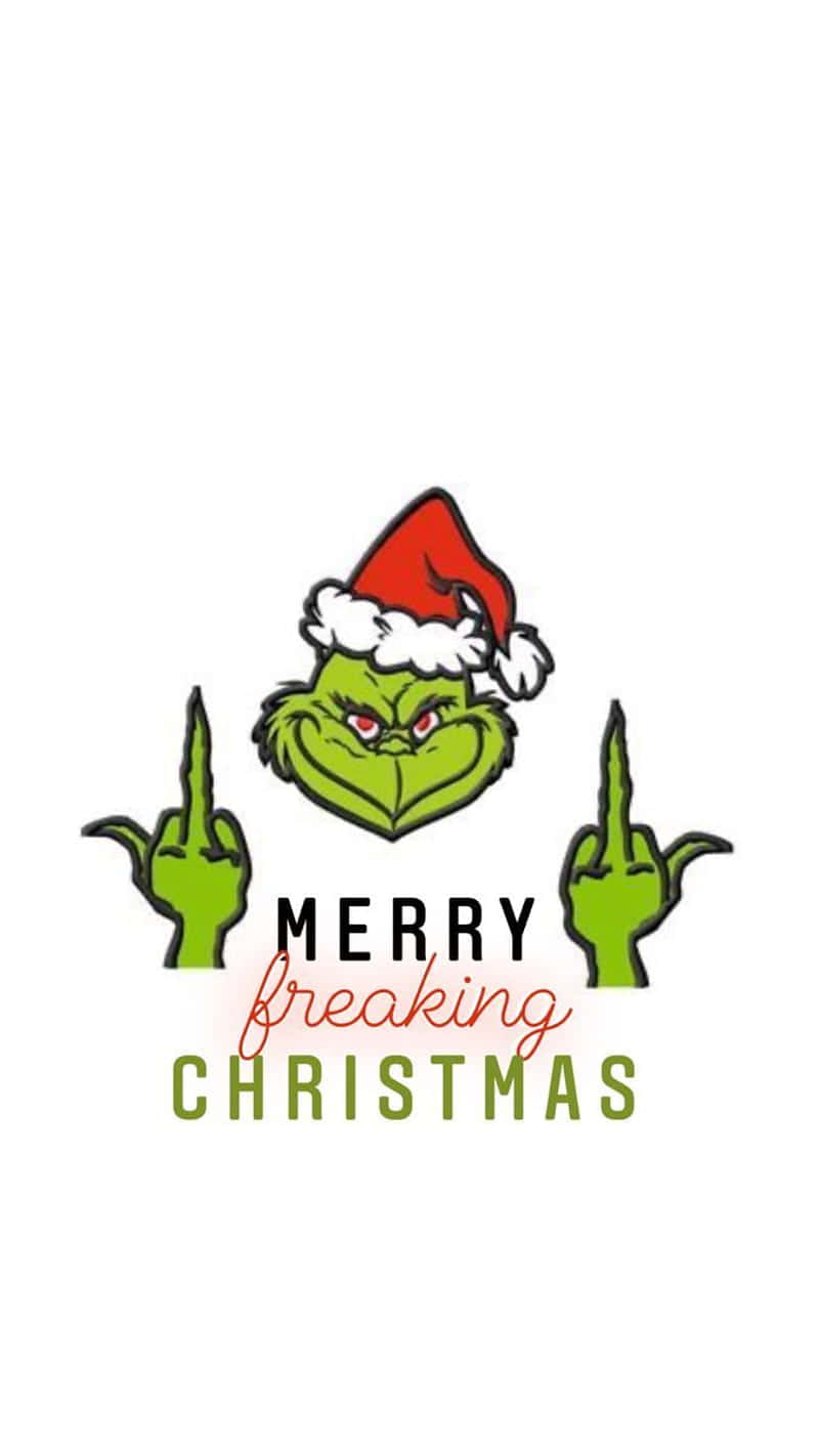 聖誕怪傑戴着聖誕帽豎中指，附文字Merry freaking Christmas
