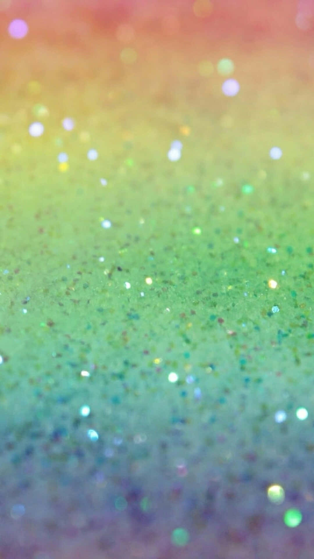 讓彩虹閃粉為您帶來魔法般的光采！ 壁紙 — 充滿活力的彩虹漸變色，點綴著閃爍的閃粉顆粒，營造出神奇的閃爍效果。