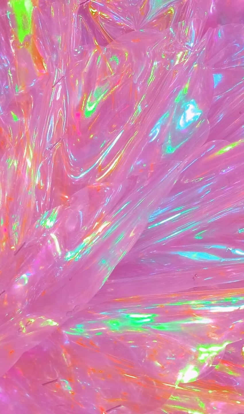 閃爍流暢紋理的全息粉紅色和綠色抽象圖案。