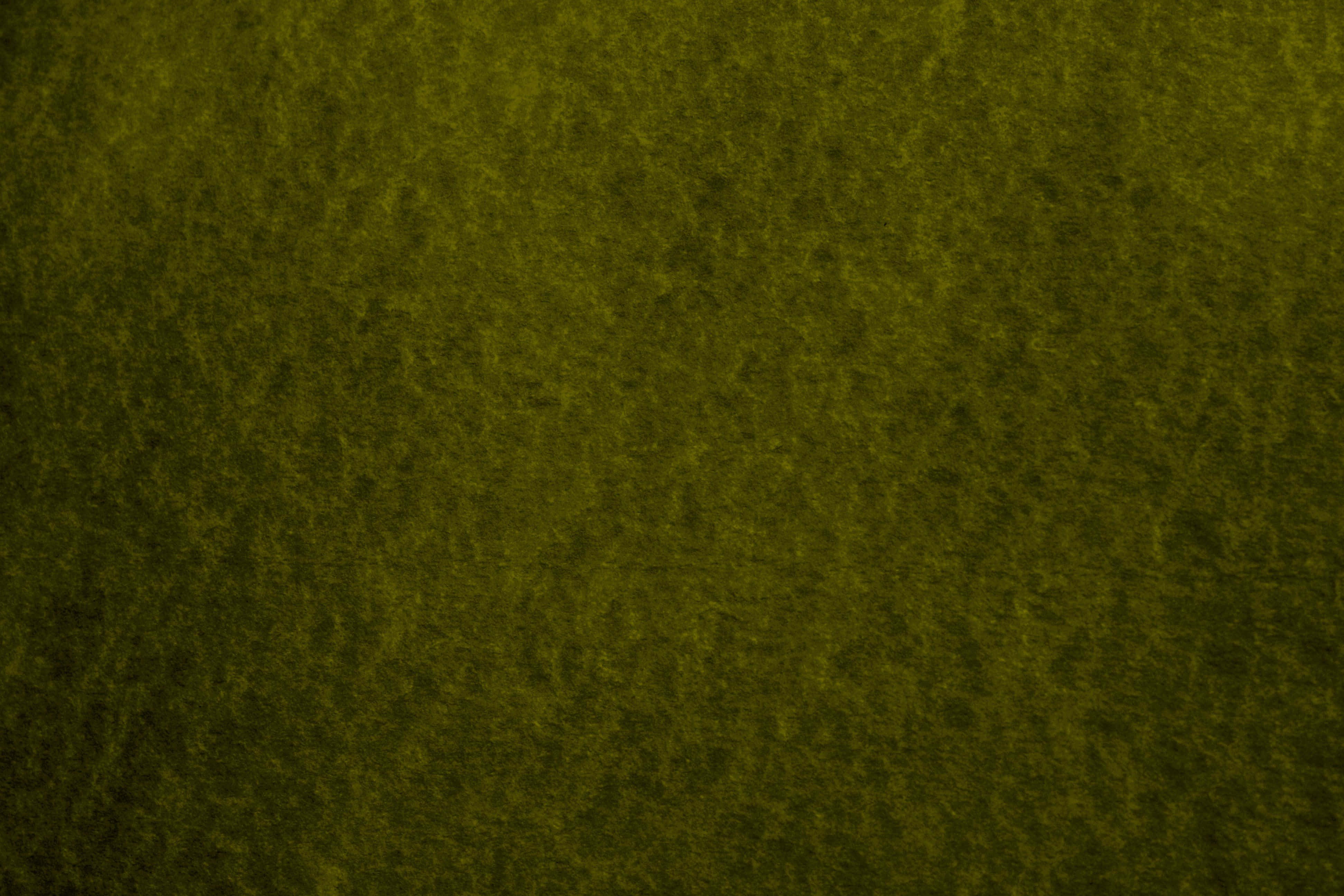 Olive Green 桌布 壁紙 — 豐富橄欖綠色紋理表面的特寫，色調和深度有細微變化。