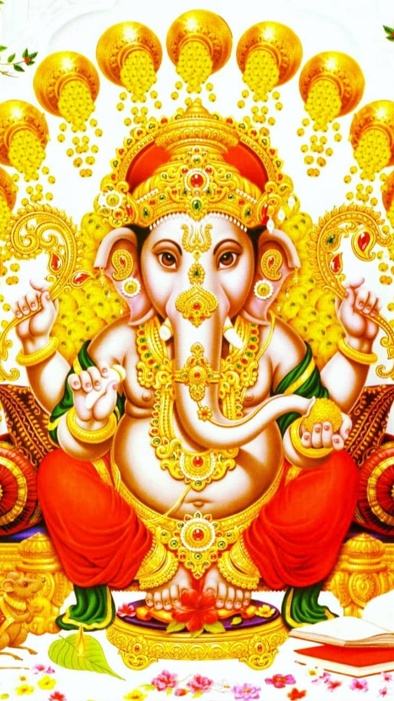 ganesh iPhone 桌布 壁紙 — 象頭神伽內什佩戴金色珠寶和紅色腰布，威嚴地坐在華麗的金色圖案和花卉點綴之中。