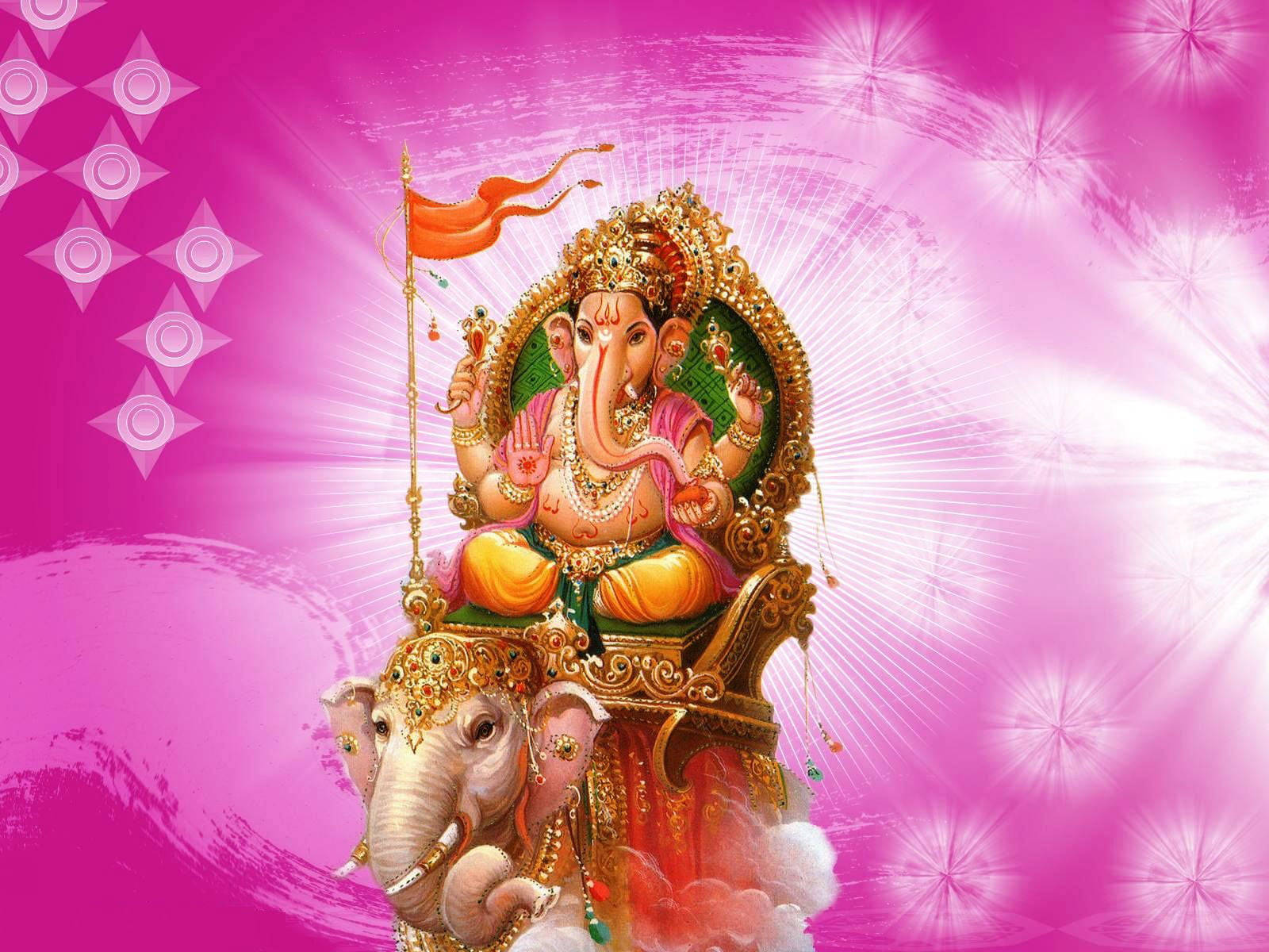 Ganesh 桌布 壁紙 — 象頭神甘尼夏飾以黃金和珠寶，威嚴地坐在大象上，背景是帶有星爆圖案的耀眼粉紅色。