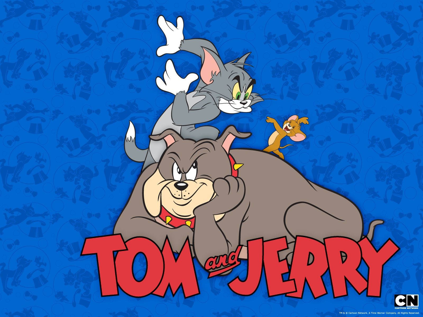 Tom And Jerry Cartoon 桌布 壁紙 — 貓湯姆和老鼠傑瑞在一隻鬥牛犬上互相追逐，背景為藍色圖案，並有粗體紅色標題文字。