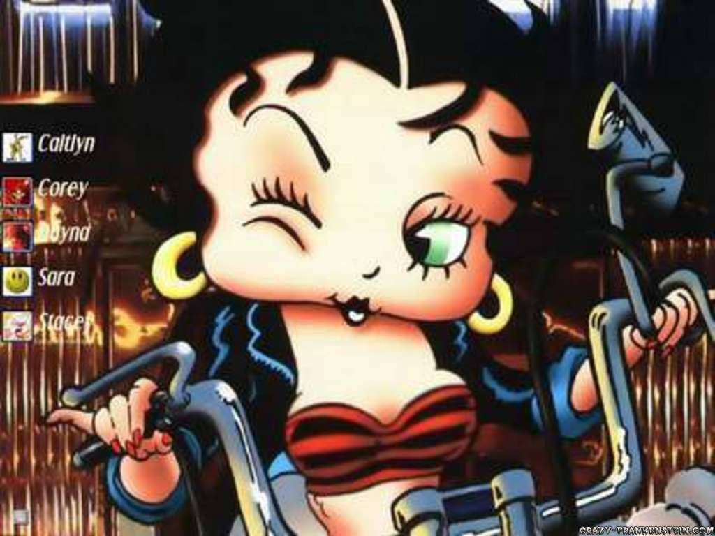 Betty Boop 在霓虹燈閃爍的城市場景中騎著電單車。