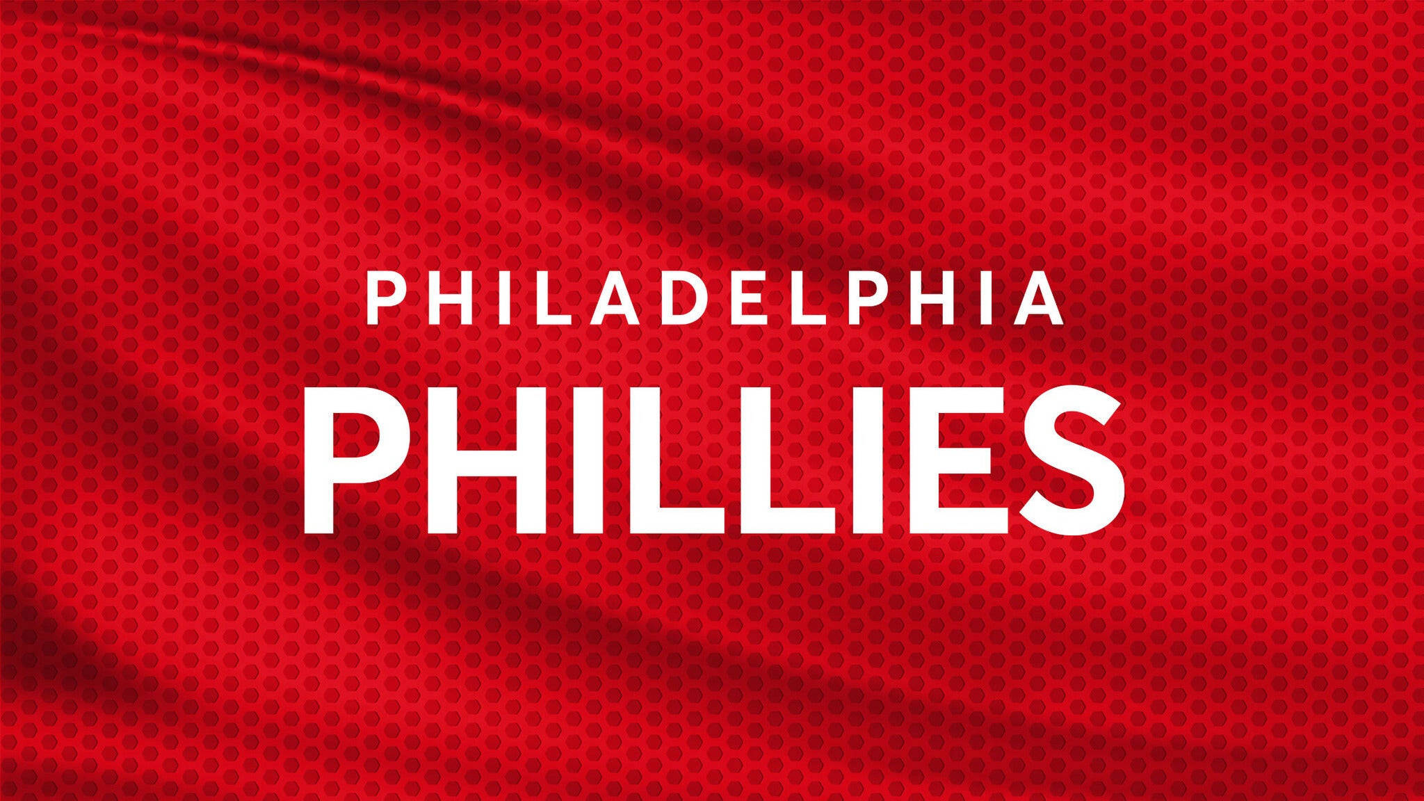 費城費城人隊文字藝術 壁紙 — 粗體白色 'PHILADELPHIA PHILLIES' 文字在帶有細微皺褶的紋理紅色布料背景上顯得格外突出。
