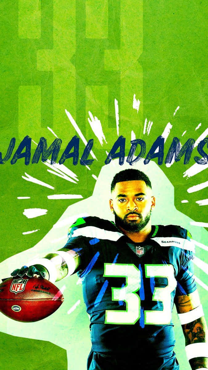 身穿海鷹隊球衣的橄欖球運動員 Jamal Adams 手持橄欖球。