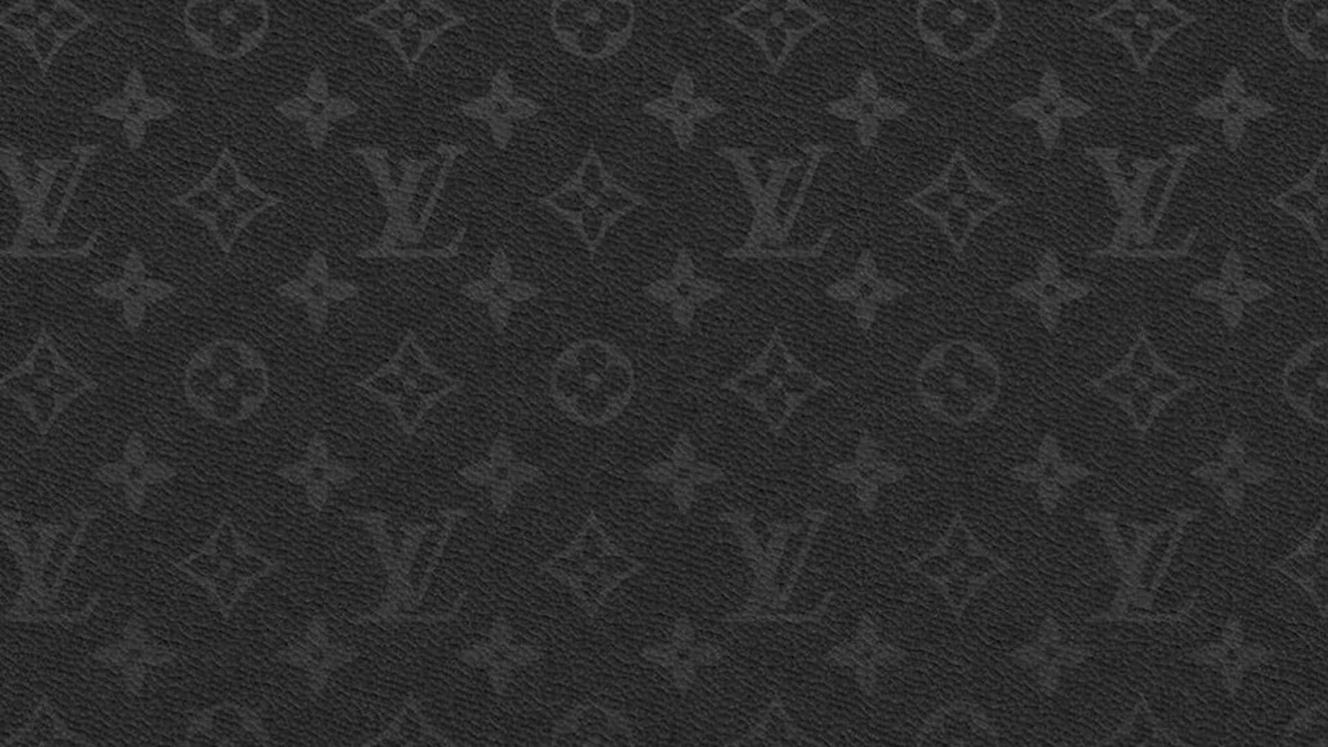 黑色皮革，帶有壓花字母組合圖案紋理。