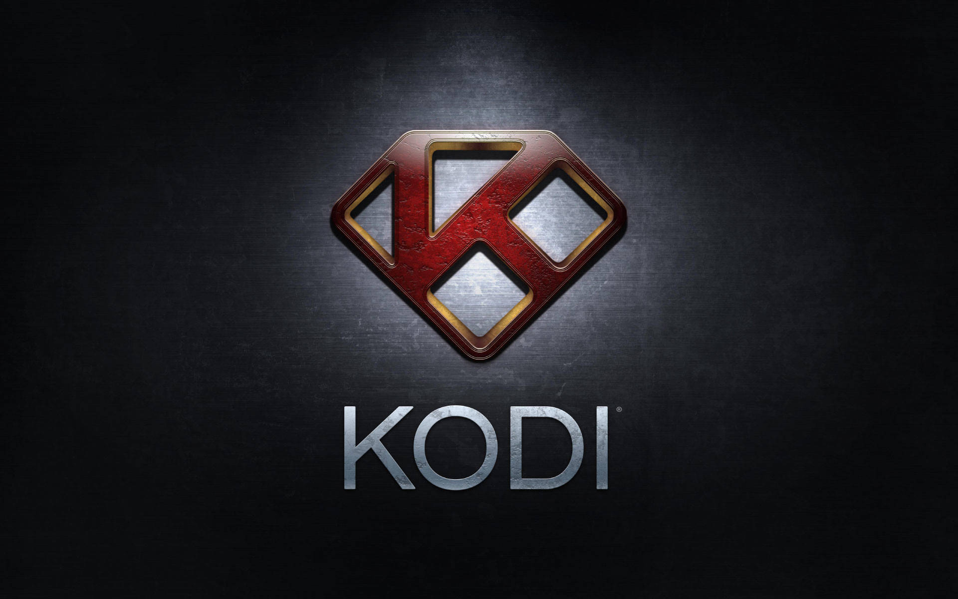 深色背景上帶有紅、金、銀金屬設計的 Kodi 媒體播放器標誌。