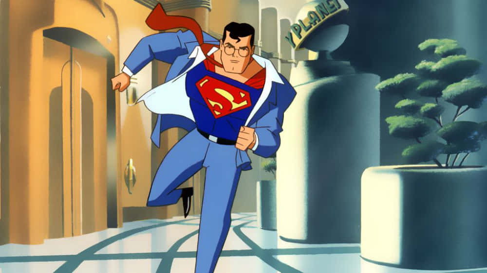 Justice League Unlimited 桌布 壁紙 — 超人穿著經典藍色西裝和紅色斗篷，自信地走過一條時尚的未來風格走廊。