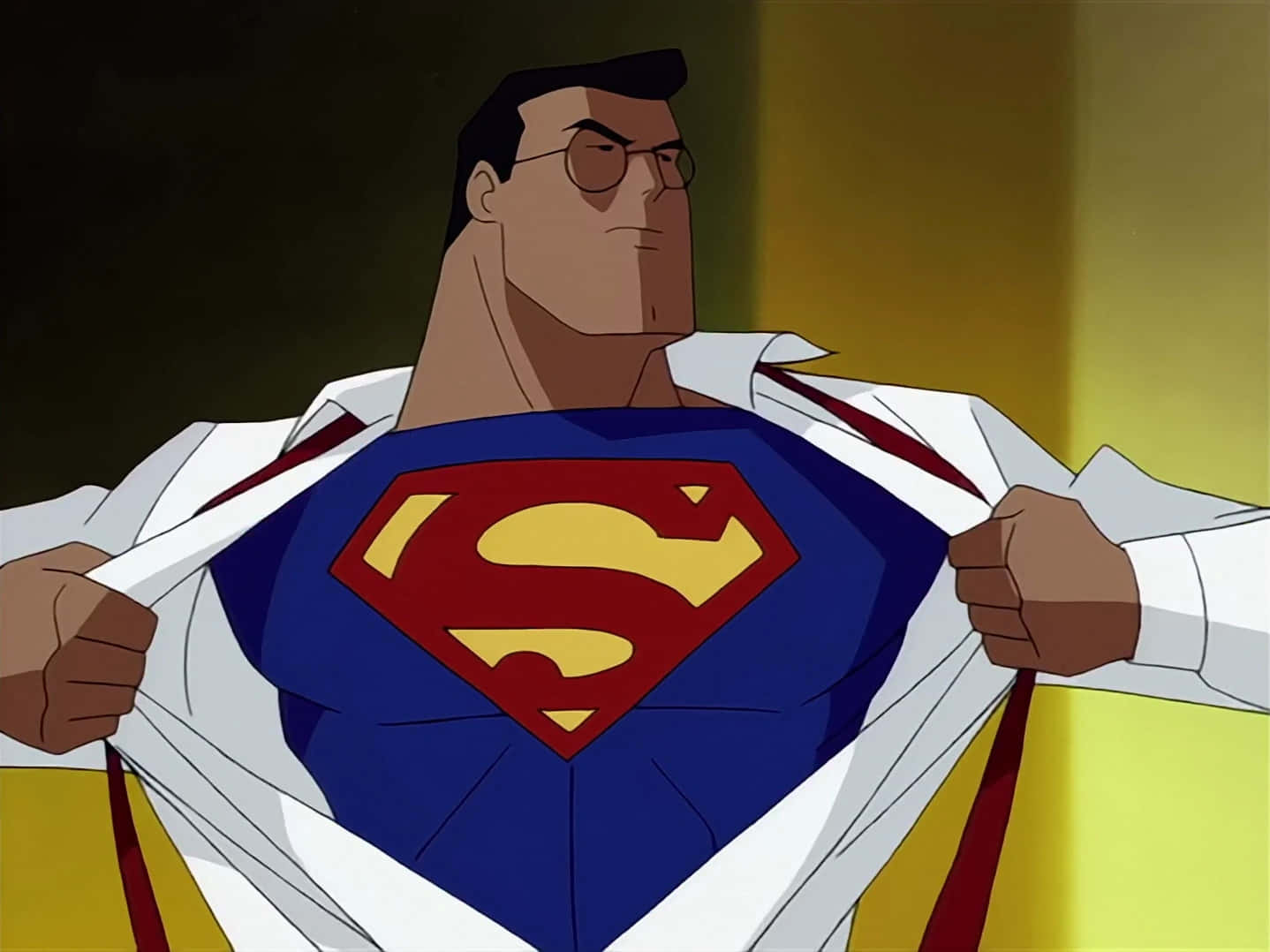 Superman The Animated Series 桌布 壁紙 — 超人脫下他的白色襯衫，露出他標誌性的藍色套裝，上面有紅色和黃色的「S」盾牌。