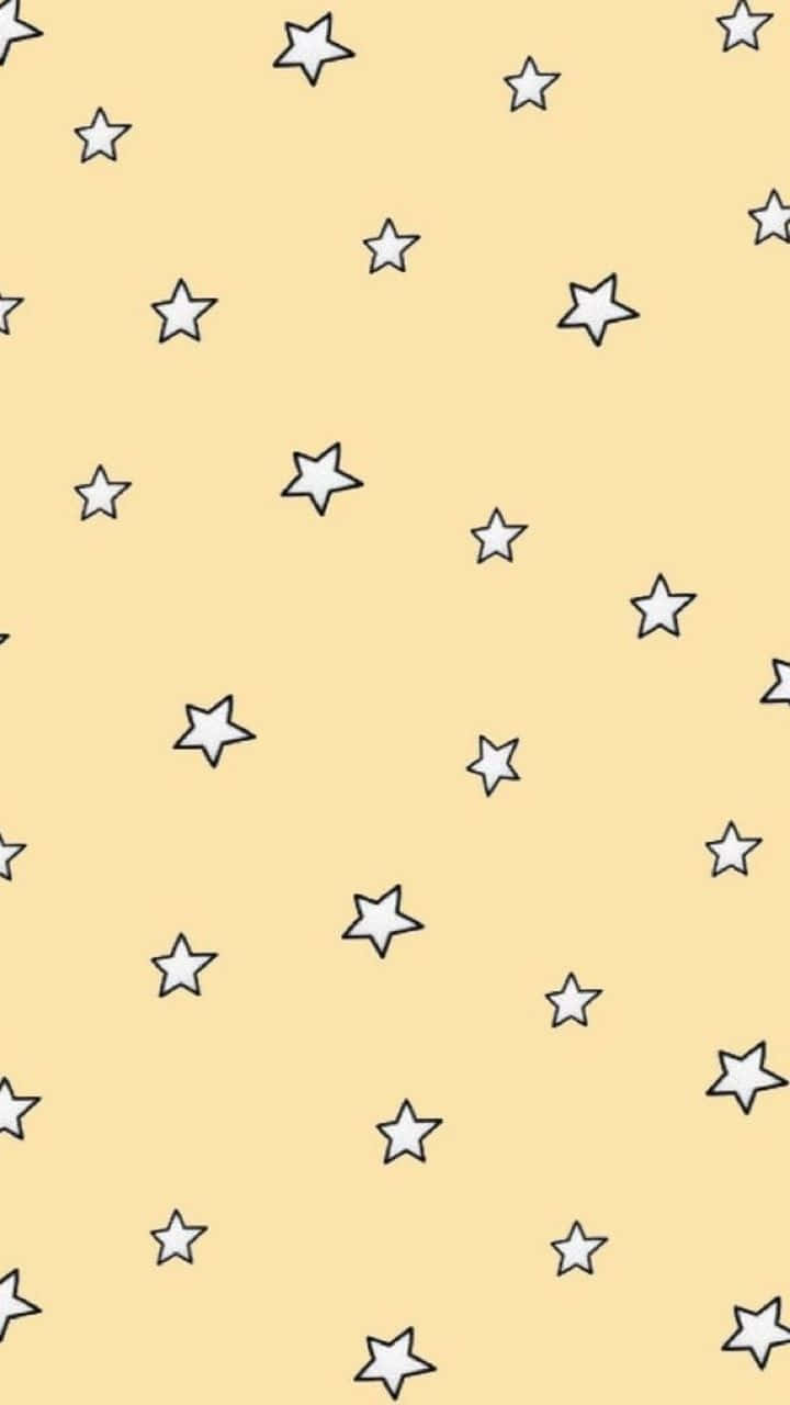 黃色背景帶有白色輪廓星星圖案
