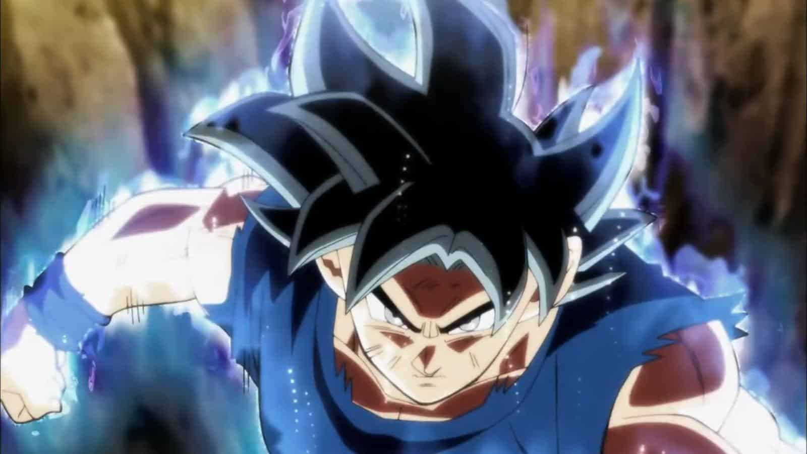 超級直覺悟空的強悍姿態 壁紙 — 動漫戰士，黑色刺蝟頭，散發藍色光芒，表情激烈向前衝刺。
