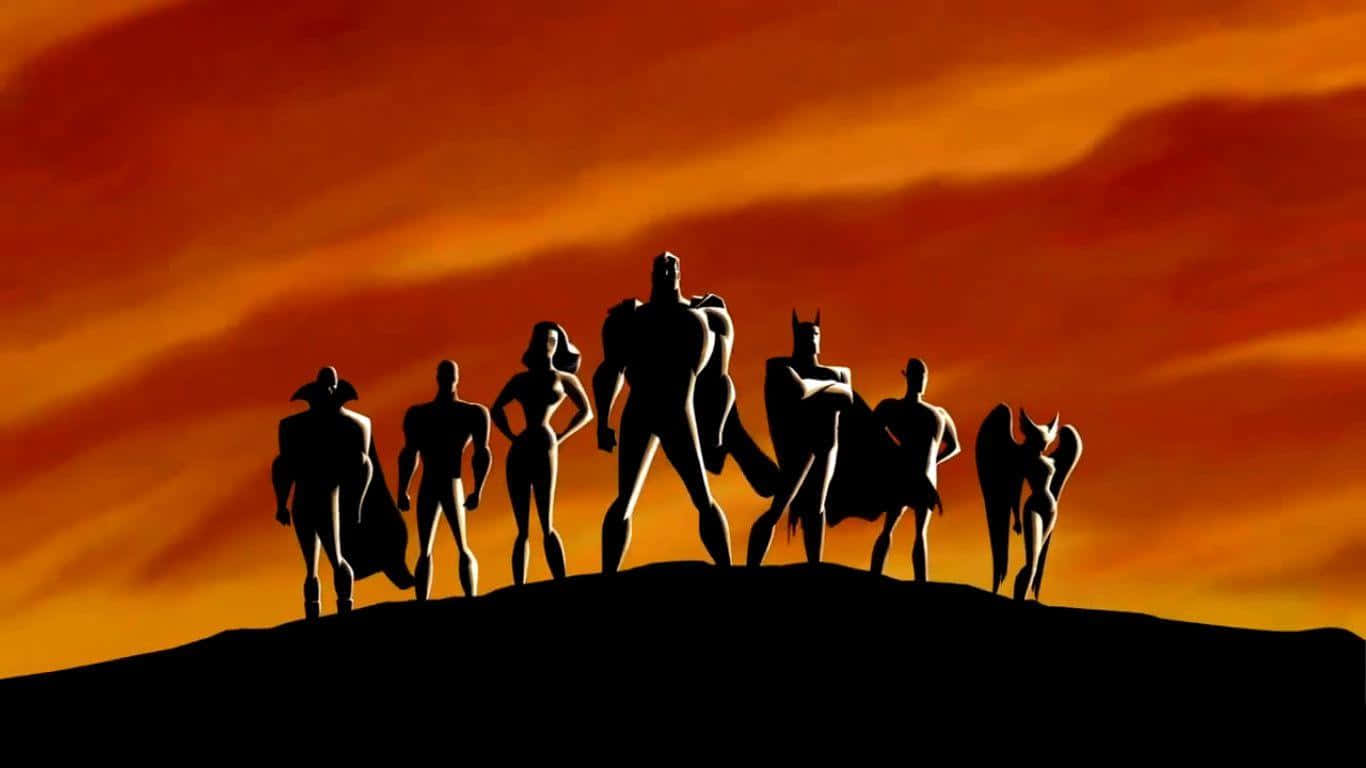 Justice League Unlimited 桌布 壁紙 — 超級英雄的剪影團結地站在山頂上，背景是火紅橙色的日落天空。