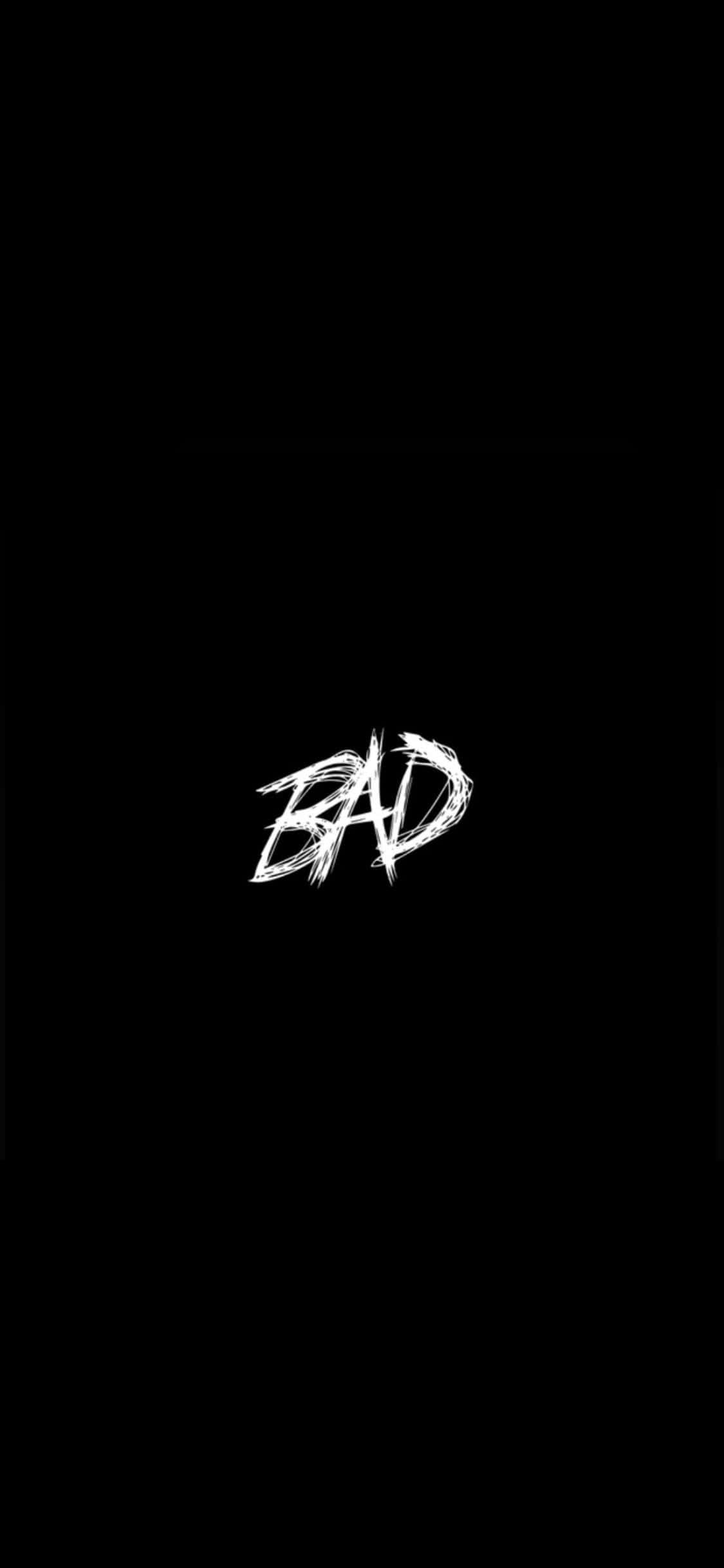 超越基礎 壁紙 — 粗體白色塗鴉風格字體 'BAD' 居中於純黑色背景上。