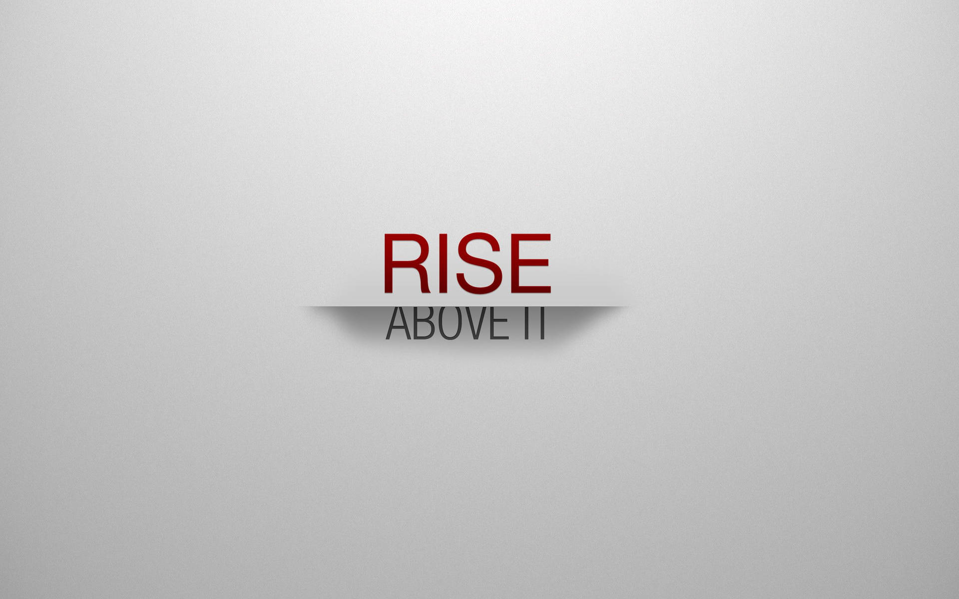 在淺灰色背景上以紅色和灰色顯示的勵志文字 'RISE ABOVE IT'。