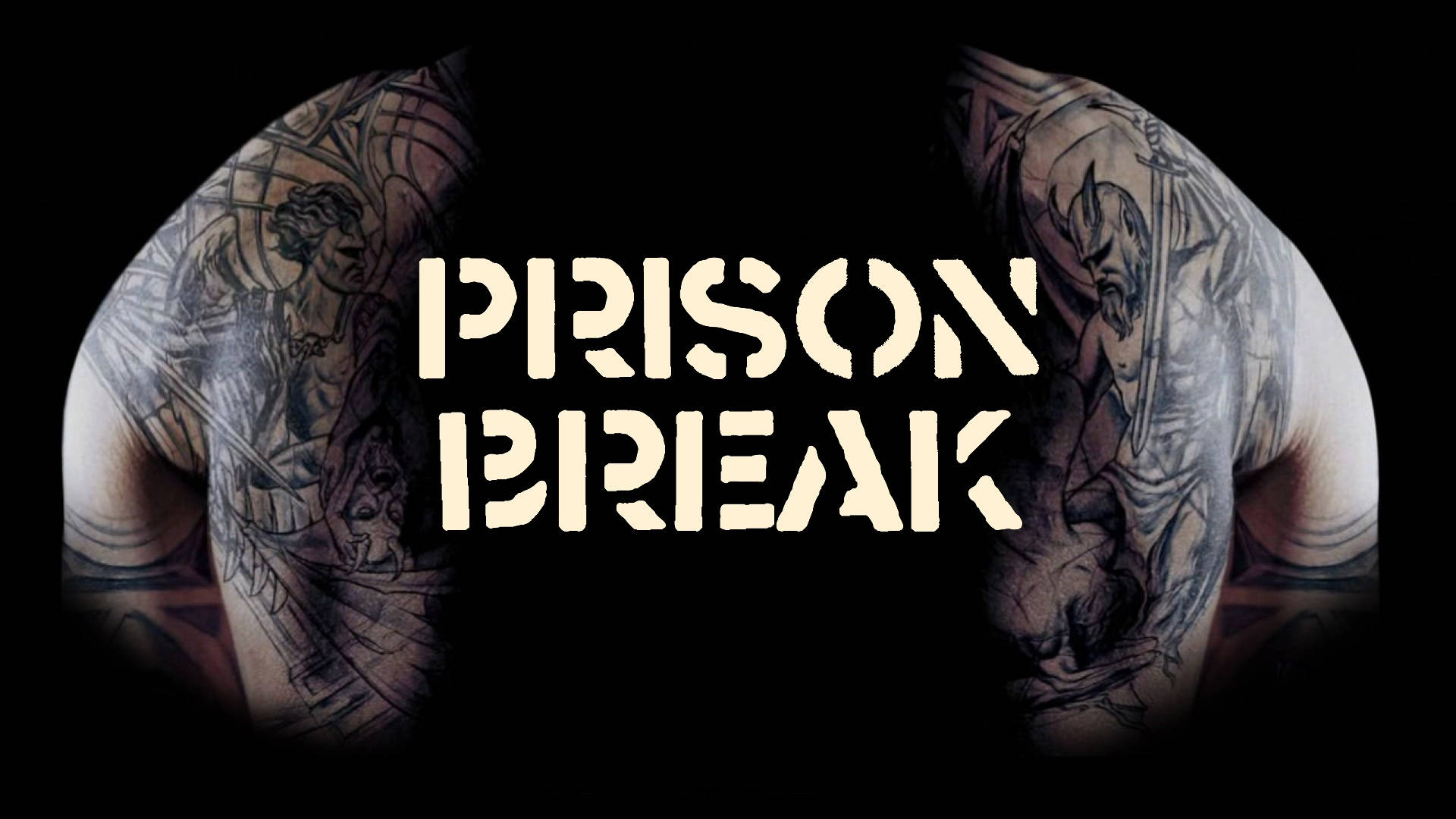 紋身肩膀帶有白色「PRISON BREAK」文字。