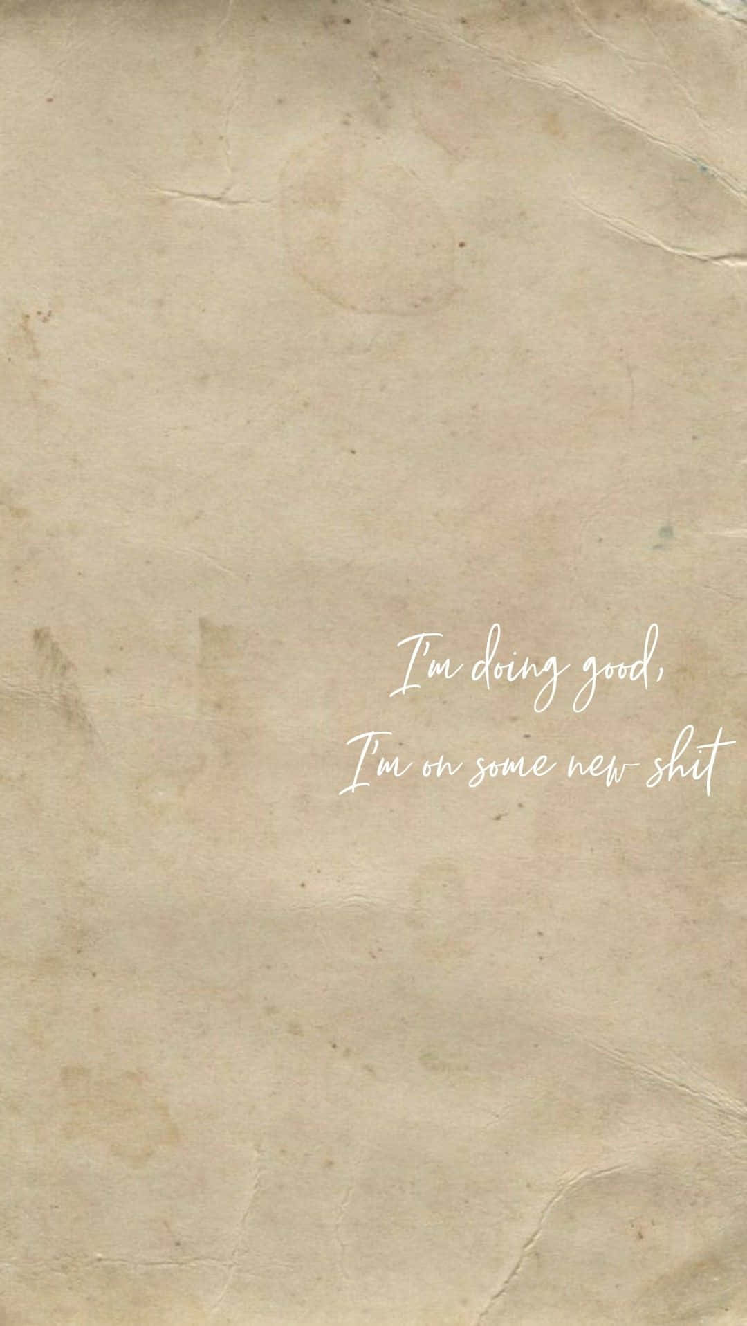 復古米色紙張帶有激勵性草書文字寫著「I'm doing good, I'm on some new shit」。
