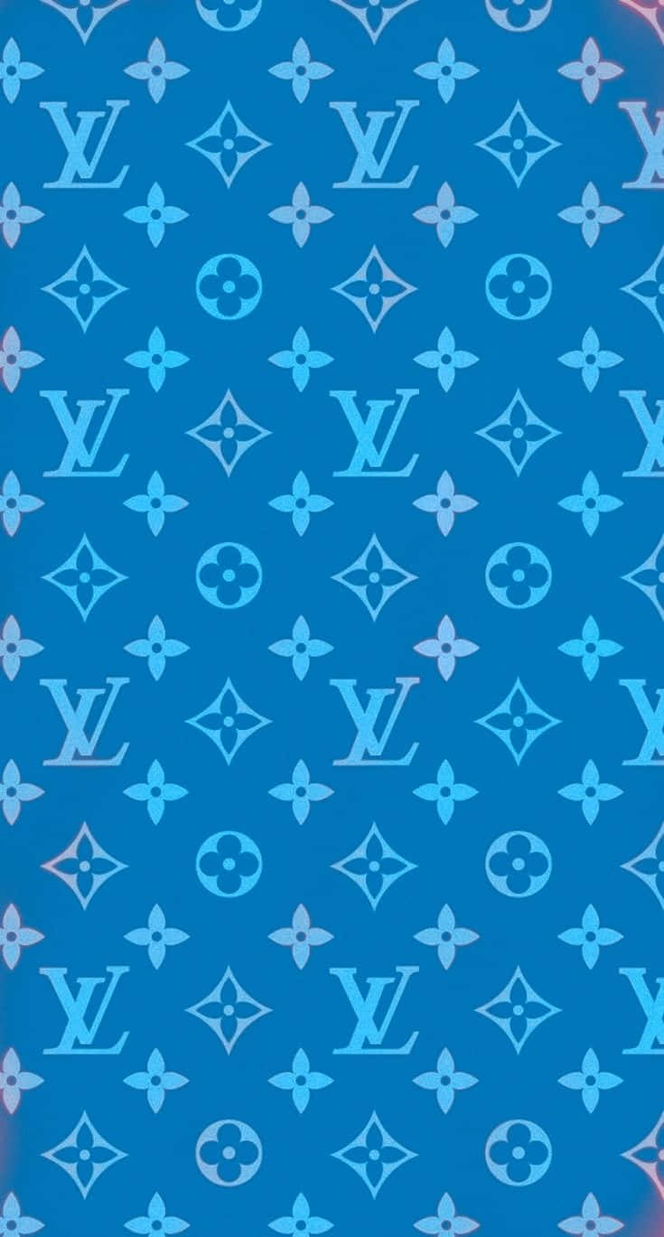 藍色 Louis Vuitton 字母組合圖案壁紙，帶漸變背景。