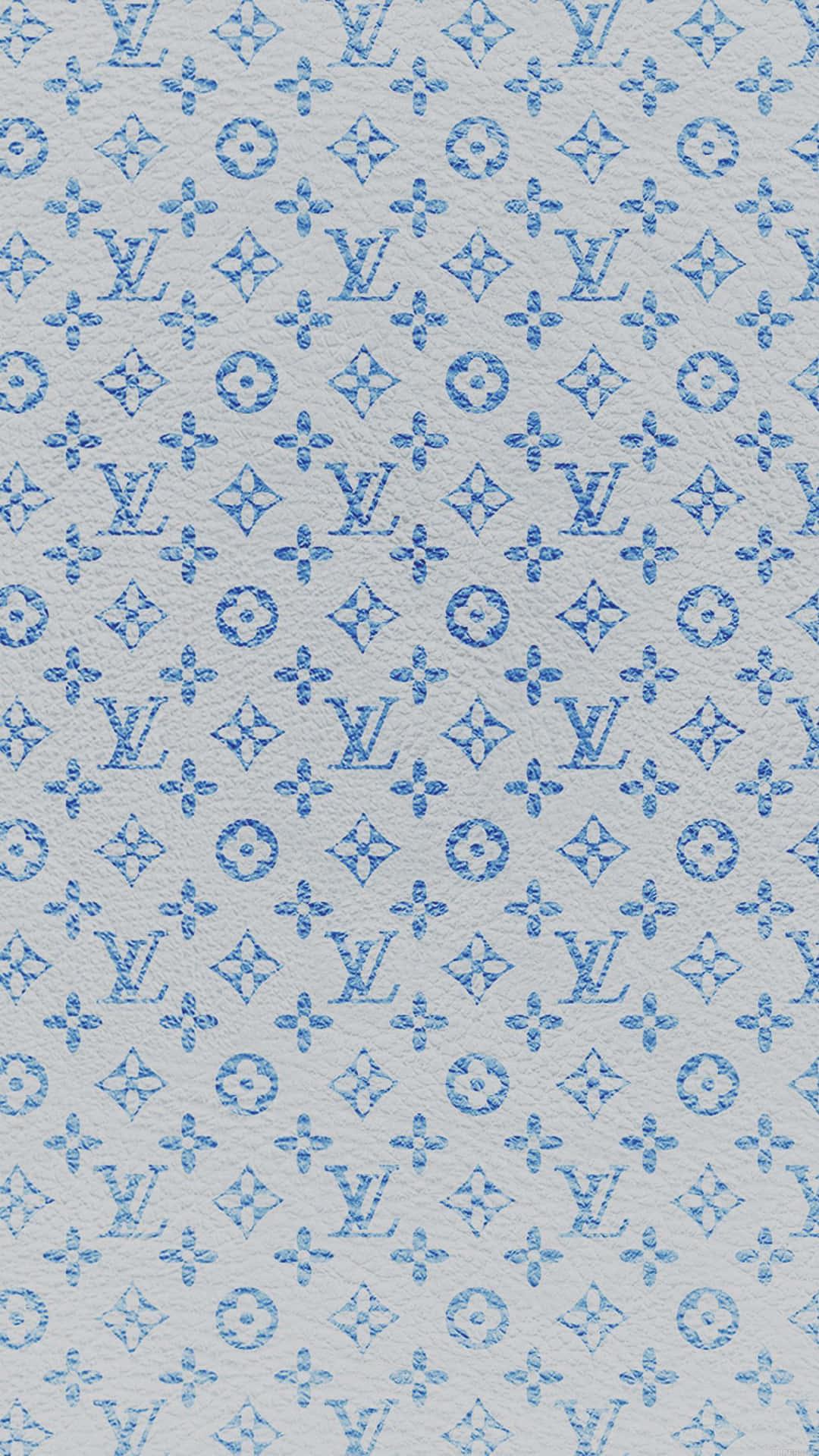 帶有紋理的淺灰色皮革上的藍色字母組合圖案。
