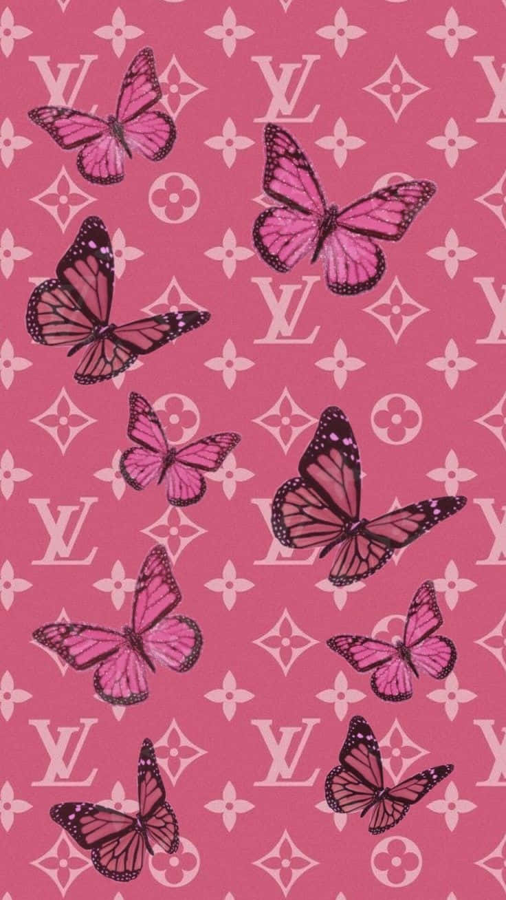 粉紅色蝴蝶帶有黑色輪廓，在 Louis Vuitton 字母圖案背景上。 — 唯美蝴蝶動圖 壁紙