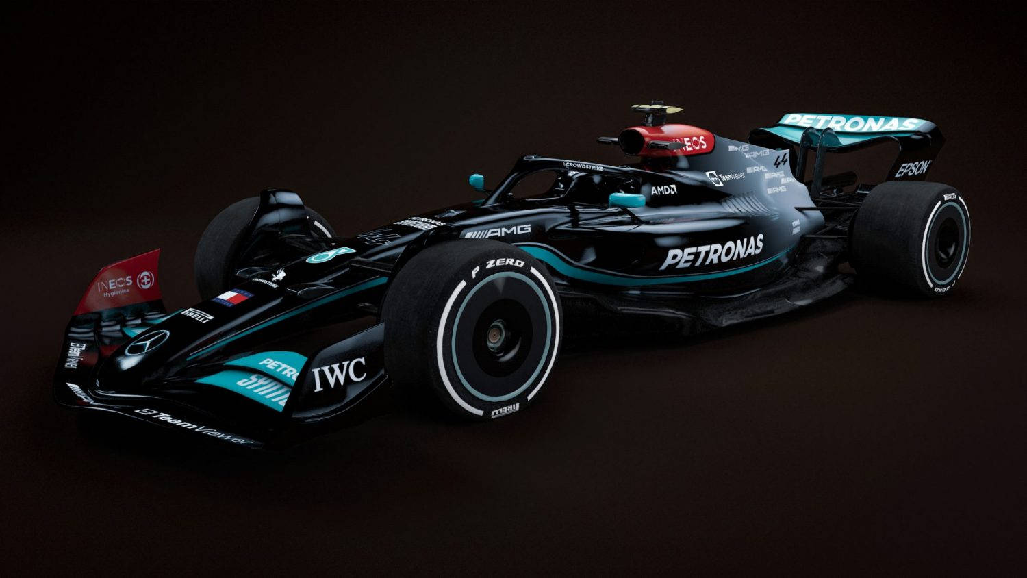 帶有Petronas品牌標誌的黑色和藍綠色一級方程式賽車，在工作室燈光下。
