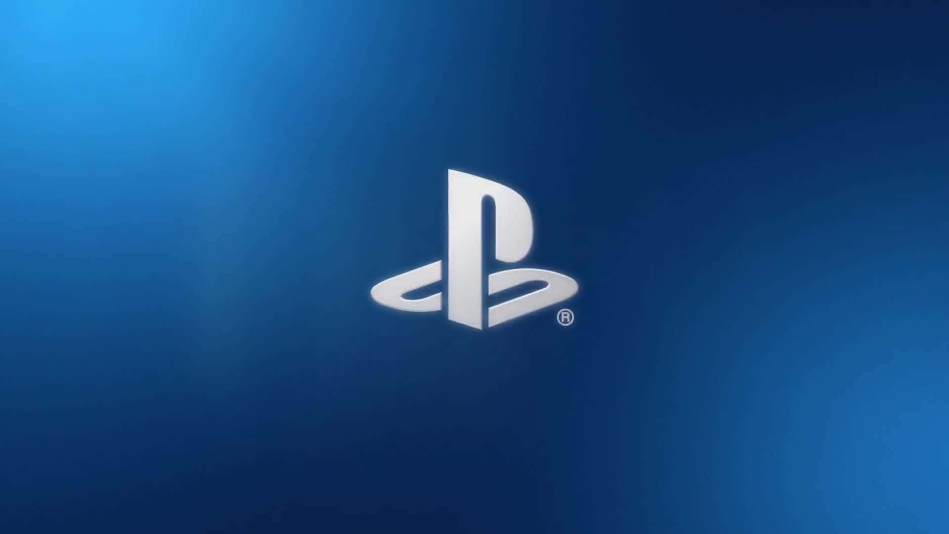 跳入 PlayStation 遊戲的精彩世界 壁紙 — 一個時尚的銀色PlayStation標誌，居中於漸變藍色背景上，帶有柔和燈光。