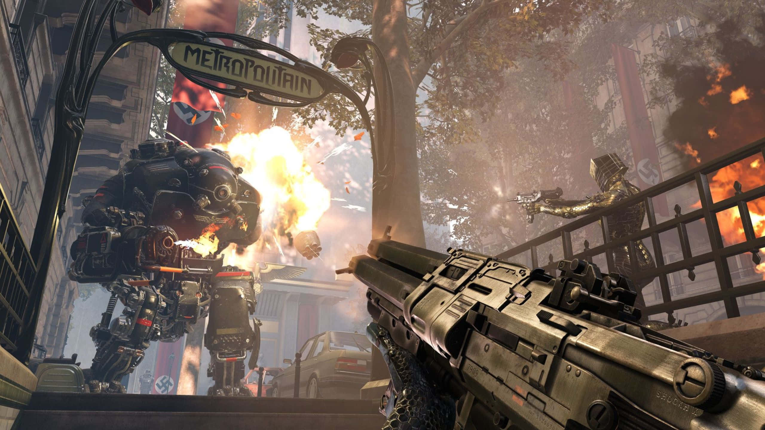 踏上壯麗冒險，與納粹勢力對抗 — Wolfenstein II 壁紙 — 第一人稱射擊視角，在城市混亂中向巨型機甲開火，伴有爆炸和納粹標誌。