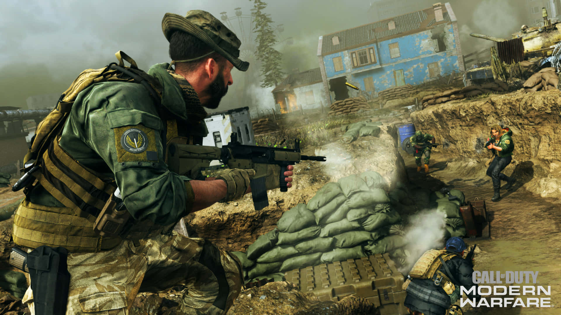 Call Of Duty Ps4 桌布 壁紙 — 身穿戰鬥裝備的士兵在煙霧和沙袋中，在一個被戰爭摧毀的村莊裡開火，村莊有受損的藍色建築物。